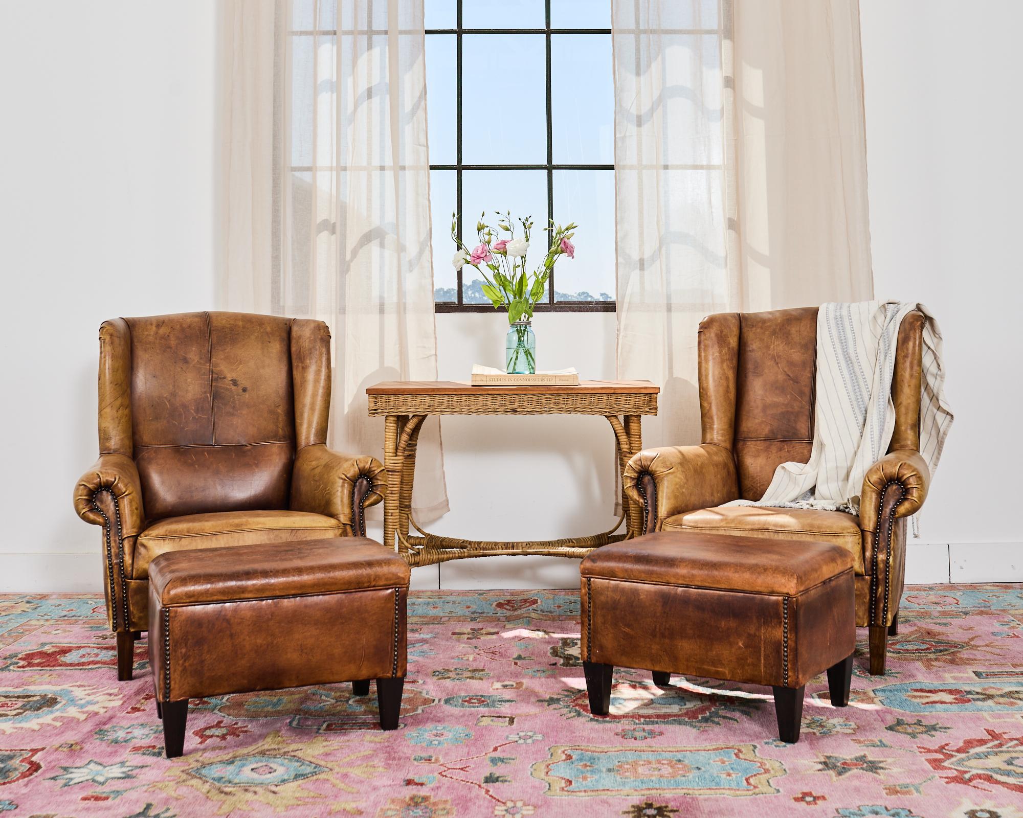 Dramatic modern design Turkish oushak carpet or rug featuring abrash colorful jewel toned hues. The rug has a distinctive pink field with a teal border decorated with stylized florals and organic shapes. The plush hand-knotted wool showcases