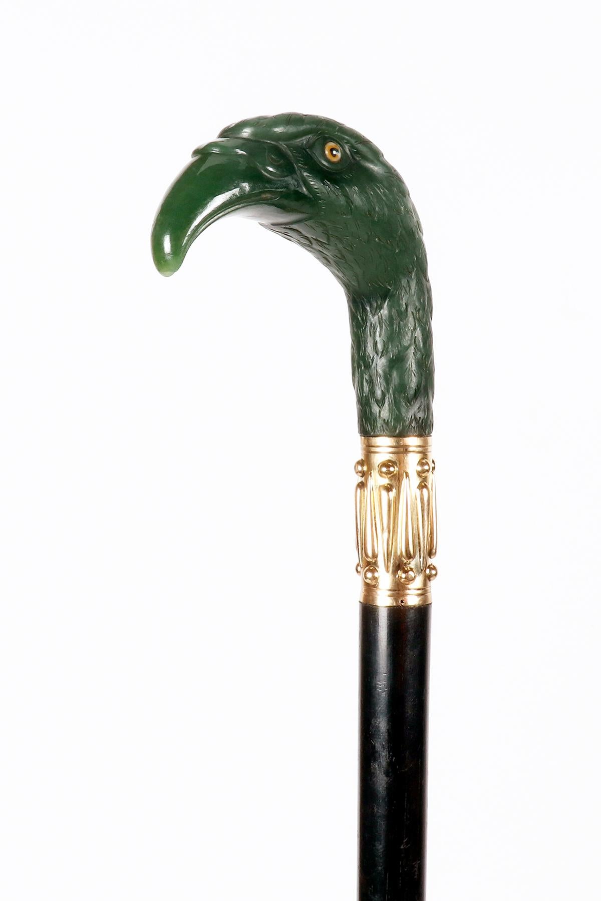 Or Canne en bijou représentant une tête d'aigle, signée André Aucoc, France 1900. en vente