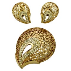 Jewelcraft Gold Plated Textured Brooch and Earrings with Rhinestones circa 1960s