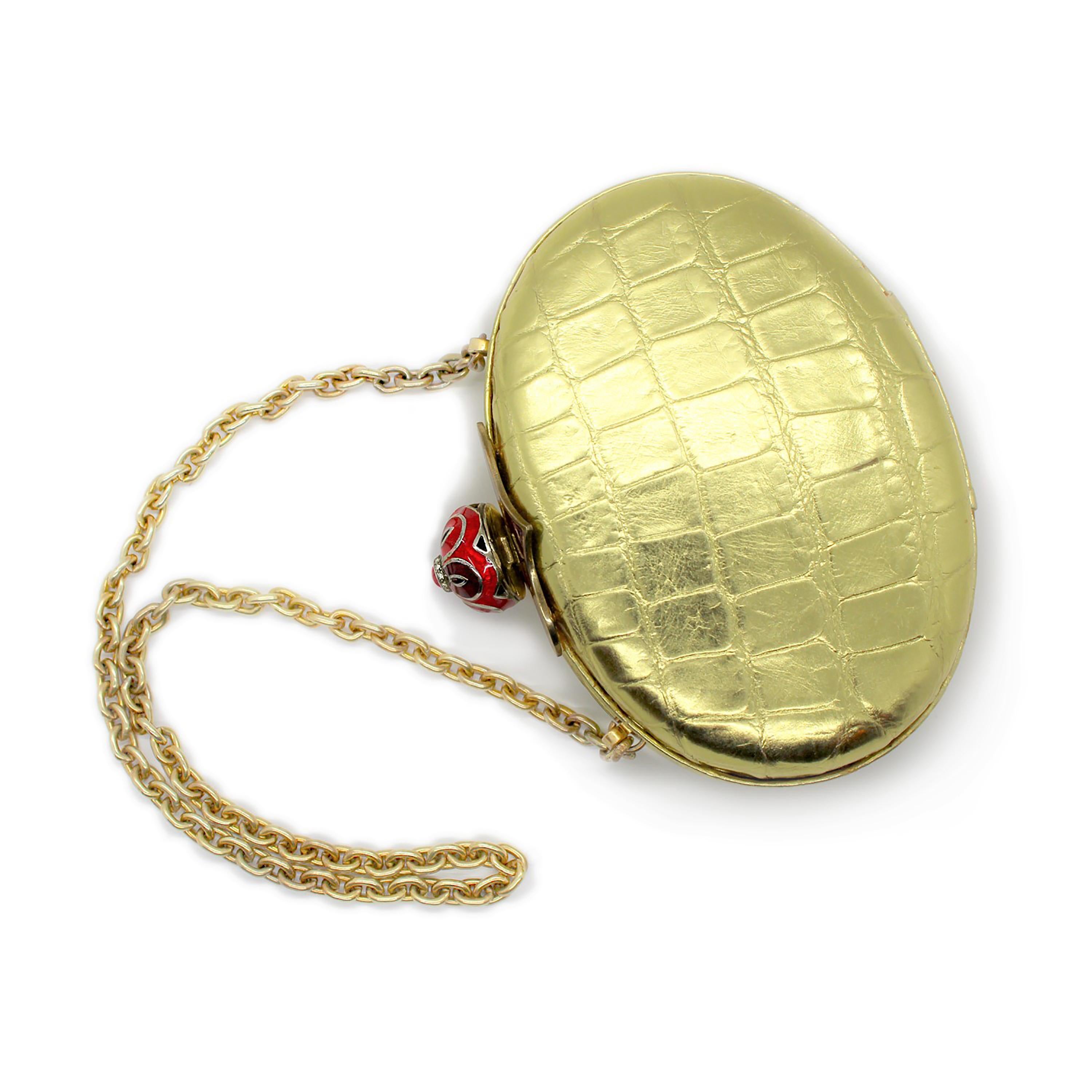 One of a kind, 20th-century sterling silver Guilloché enamel gold exotic skin Minaudière
Silver Clasp pave set with 0.15 carats of diamonds, yellow gold plated
Bezel set cabochon ruby weighing 1.45 carats
11