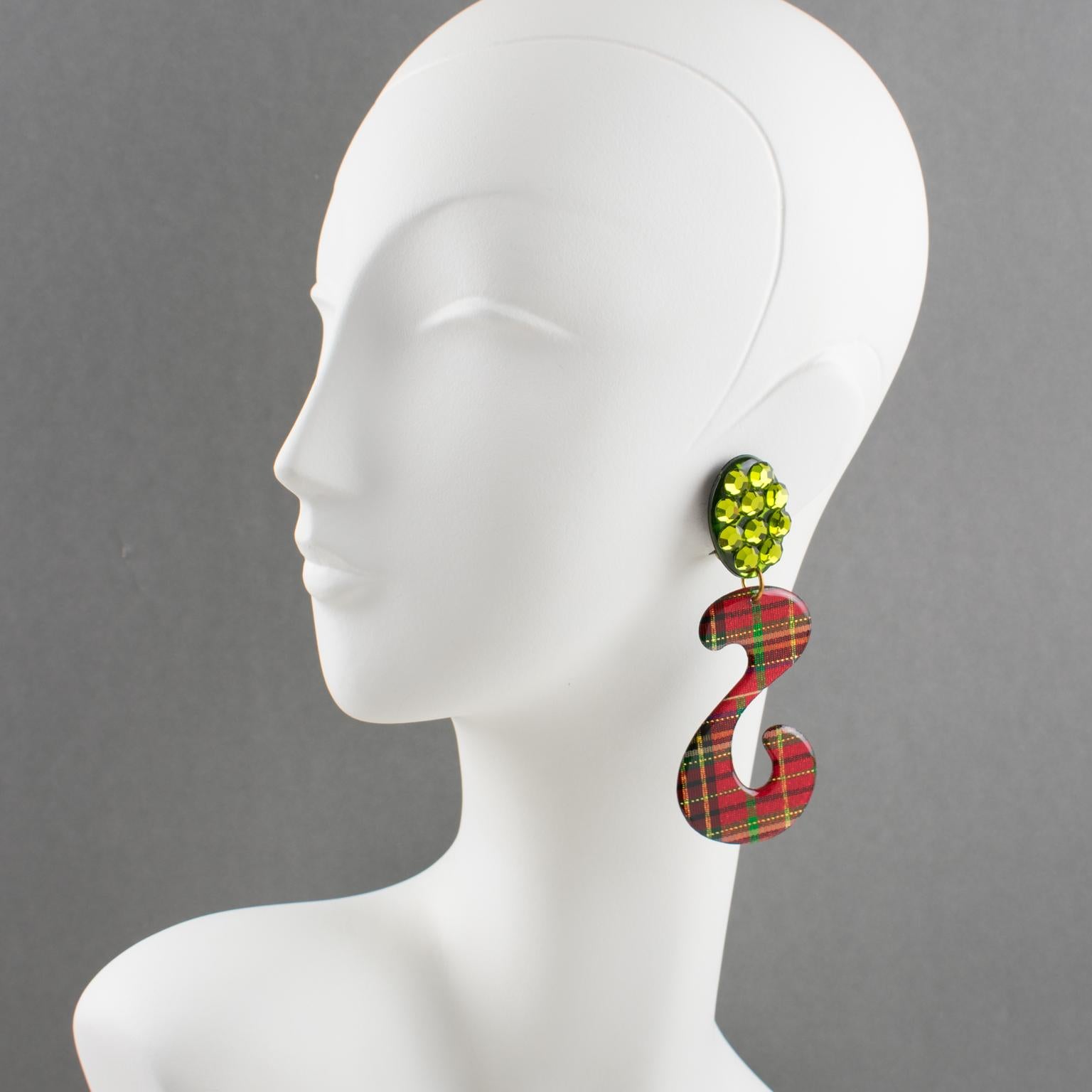 These impressive Italian Lucite or Resin dangling clip-on earrings feature an oversized chandelier shape with an 