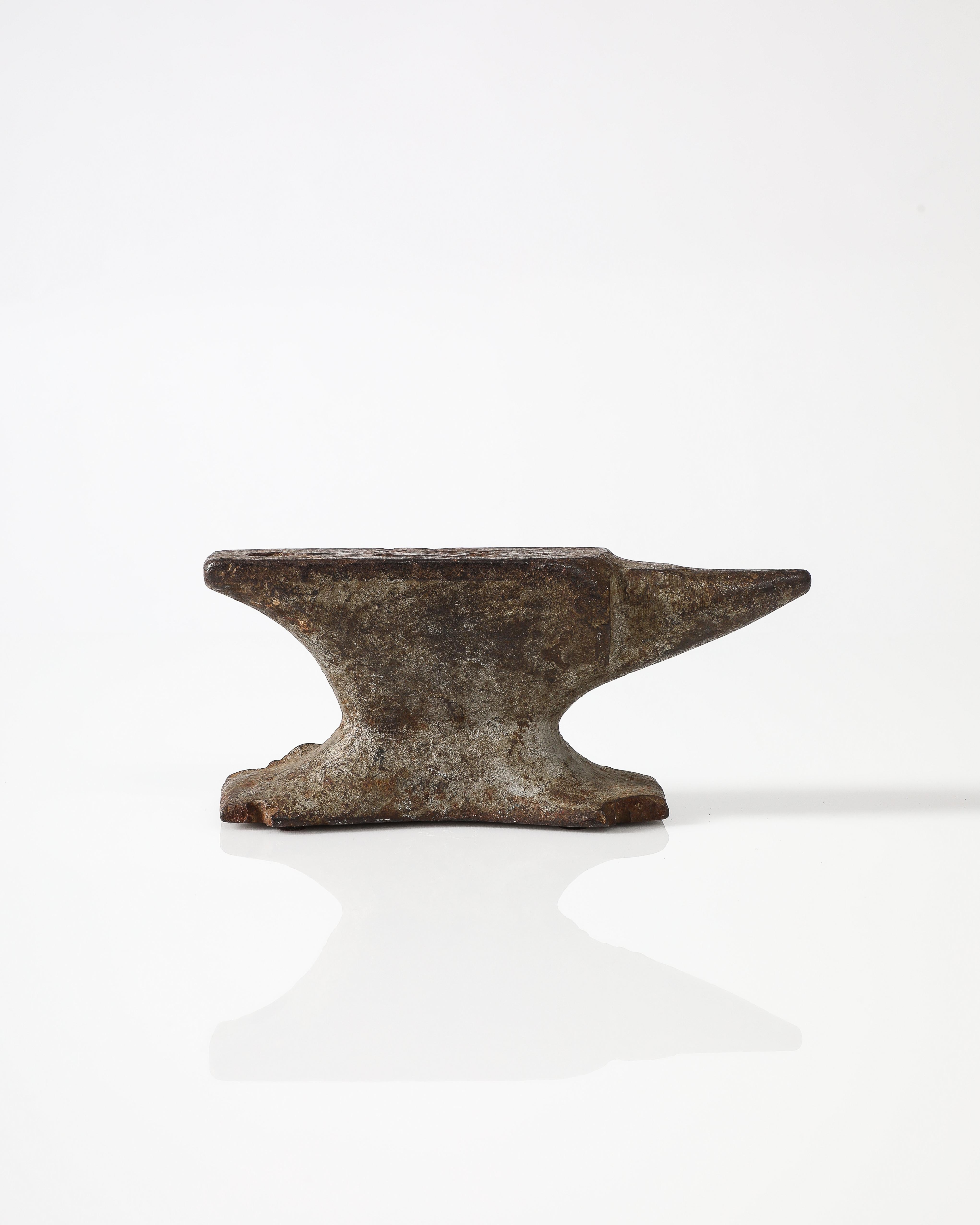 Vintage jeweler's anvil, wear consistent with age and use.
