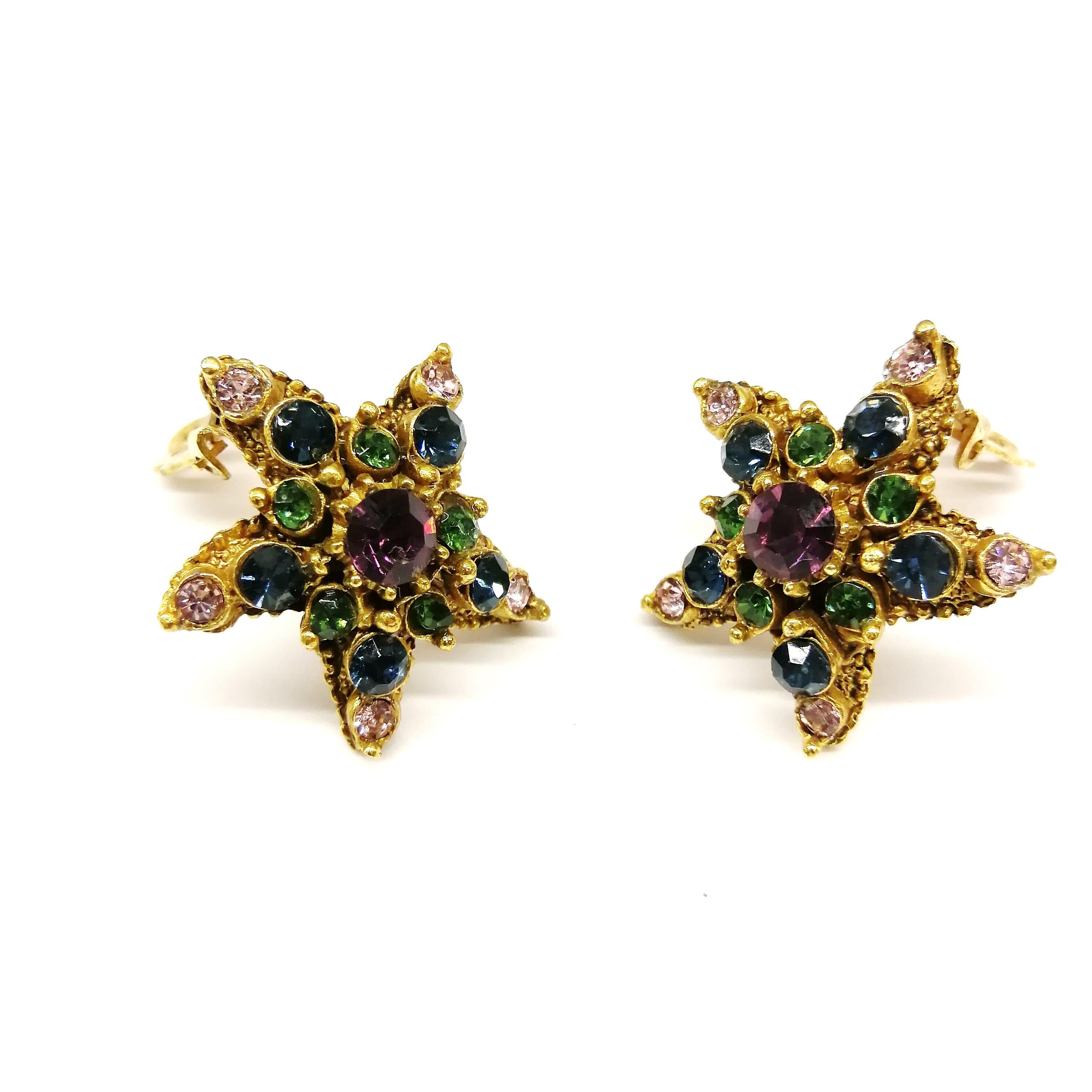 Lovely jewelled earrings in soft colours and soft toned gilt metal, in the form of a stylised 'starfish', from Florenza, from the 1960s.
As you might not expect, Florenza costume jewellery was not named as an homage to Florence, Italy. Instead, it