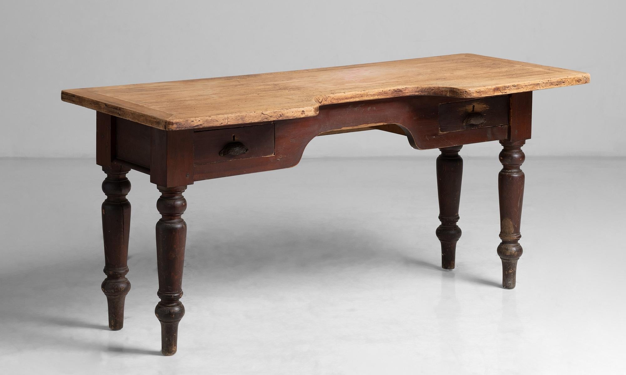 Jeweller's work table.

England, Circa 1870

Constructed in pine, with cut away to the front allowing the worker to get closer.

KMeasures: 66