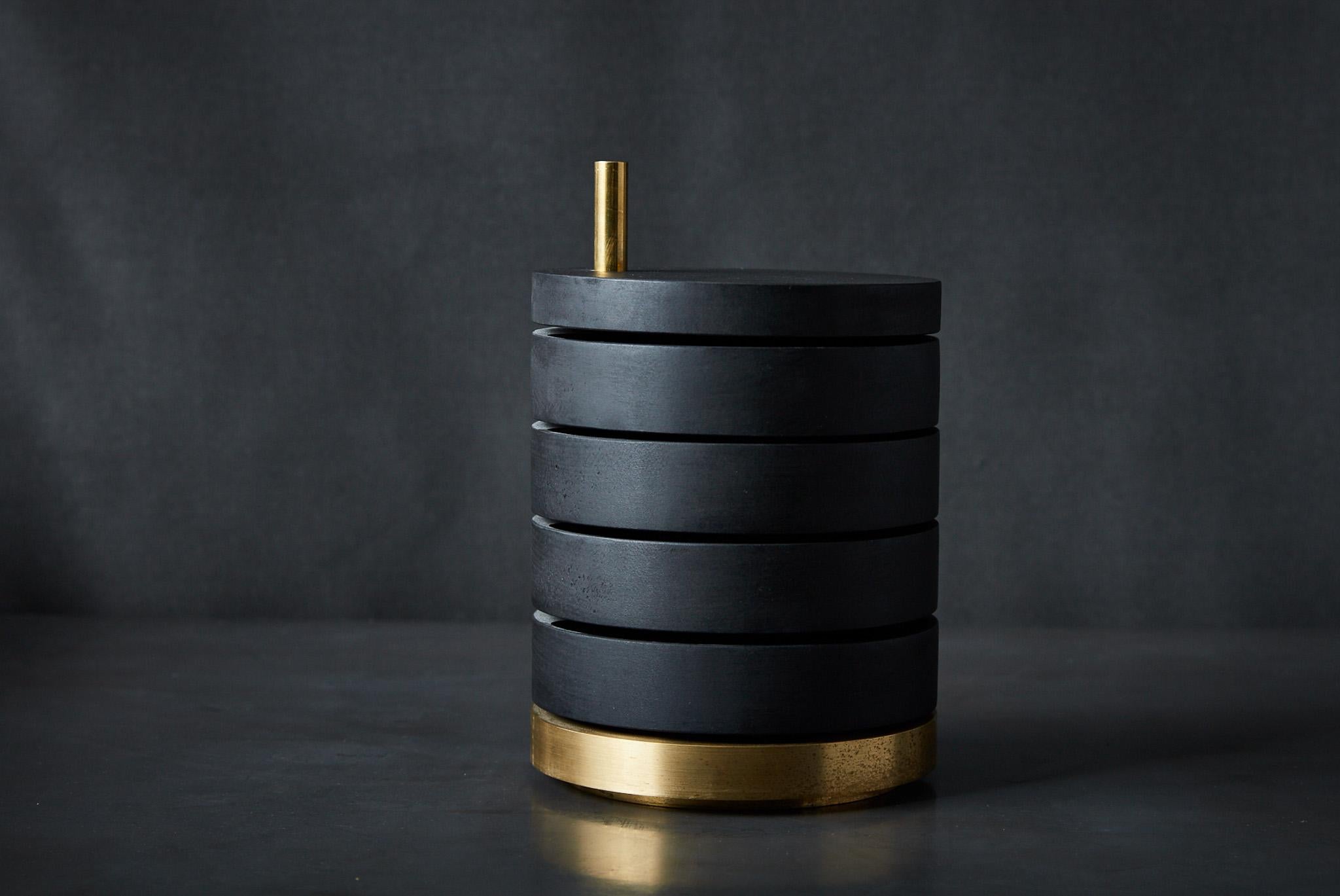 Jewelry Box 1 features four rotating trays that swing 360 degrees with the tap of a finger, lined with suede leather and grounded by a solid steel or bronze base. A stunning sculptural presence with a shapeshifting silhouette.

Black inner lining. 
