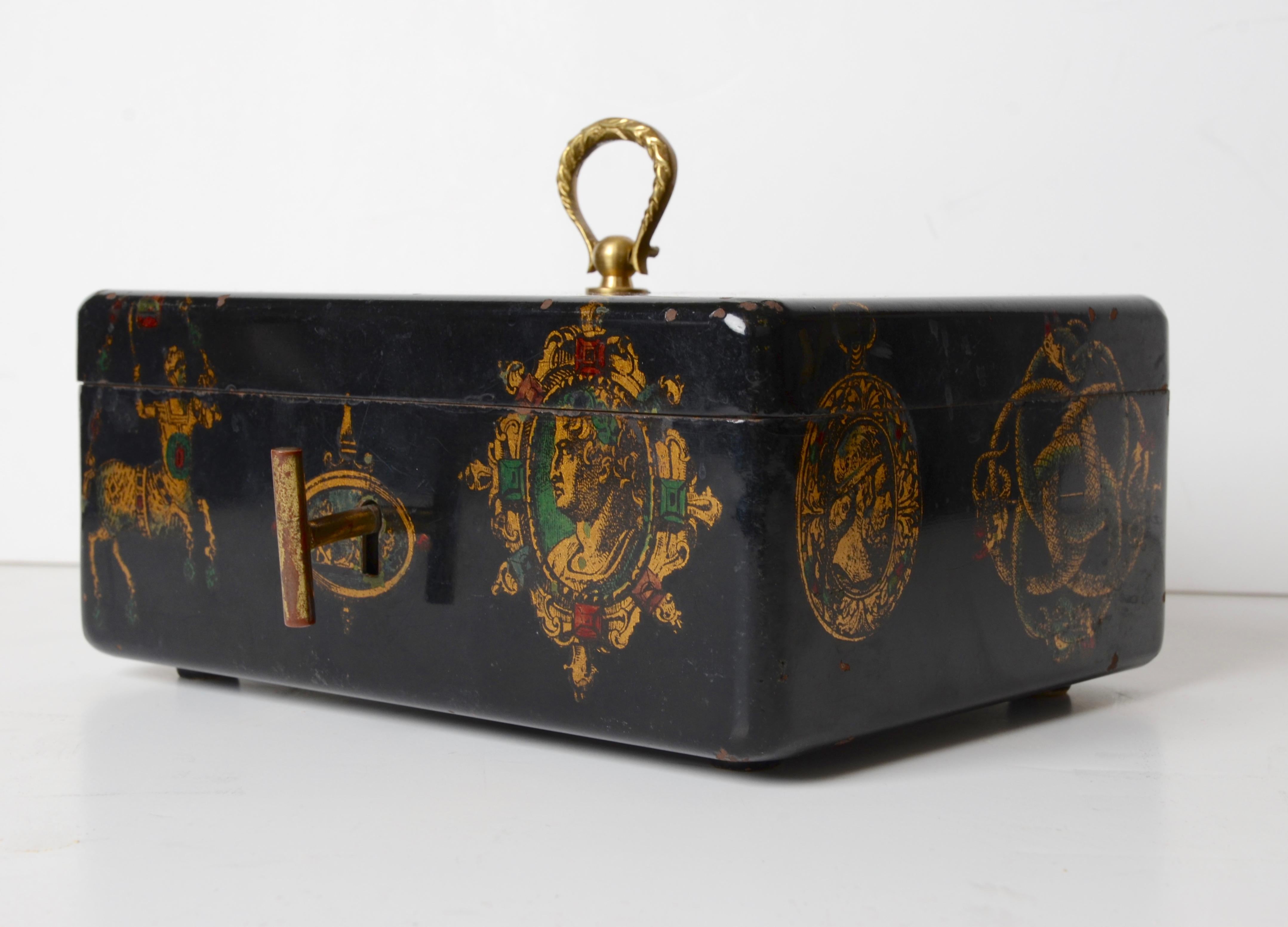 Jewelry box with decor of jewels, by Fornasetti, mid-1900s. Label: Fornasetti Milan. Made in Italy.

Lacquered metal. Original brass key.