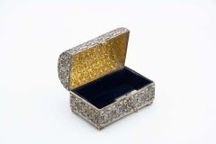 Jewelry box, embossed silver in the shape of a chest