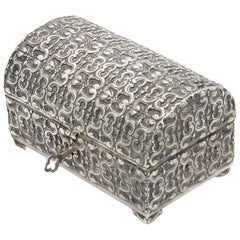 Jewelry box, embossed silver in the shape of a chest