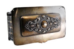 Jewelry box, in embossed silver on the casing and hinged lid