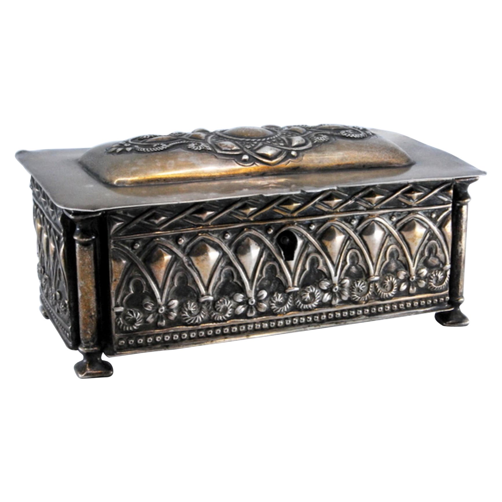 Jewelry box, in embossed silver on the casing and hinged lid