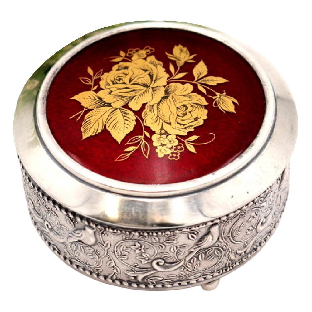 Jewelry box in embossed silver with floral and bird motifs