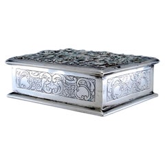 Jewelry box in embossed silver with scrolls and plant motifs