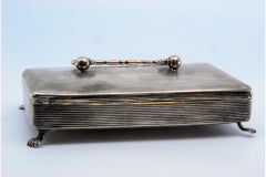 Jewelry box, in fluted silver with handle and hinged lid