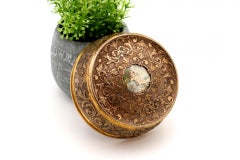 Jewelry box, in gilded silver with floral reliefs