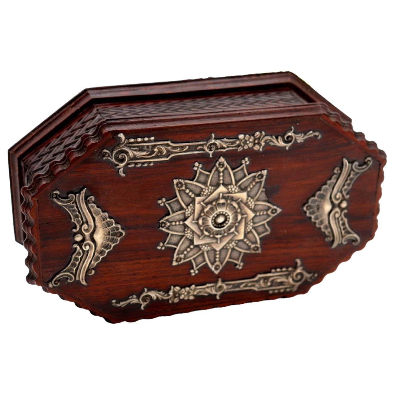 Jewelry box, in rosewood with raised silver accents and trembles