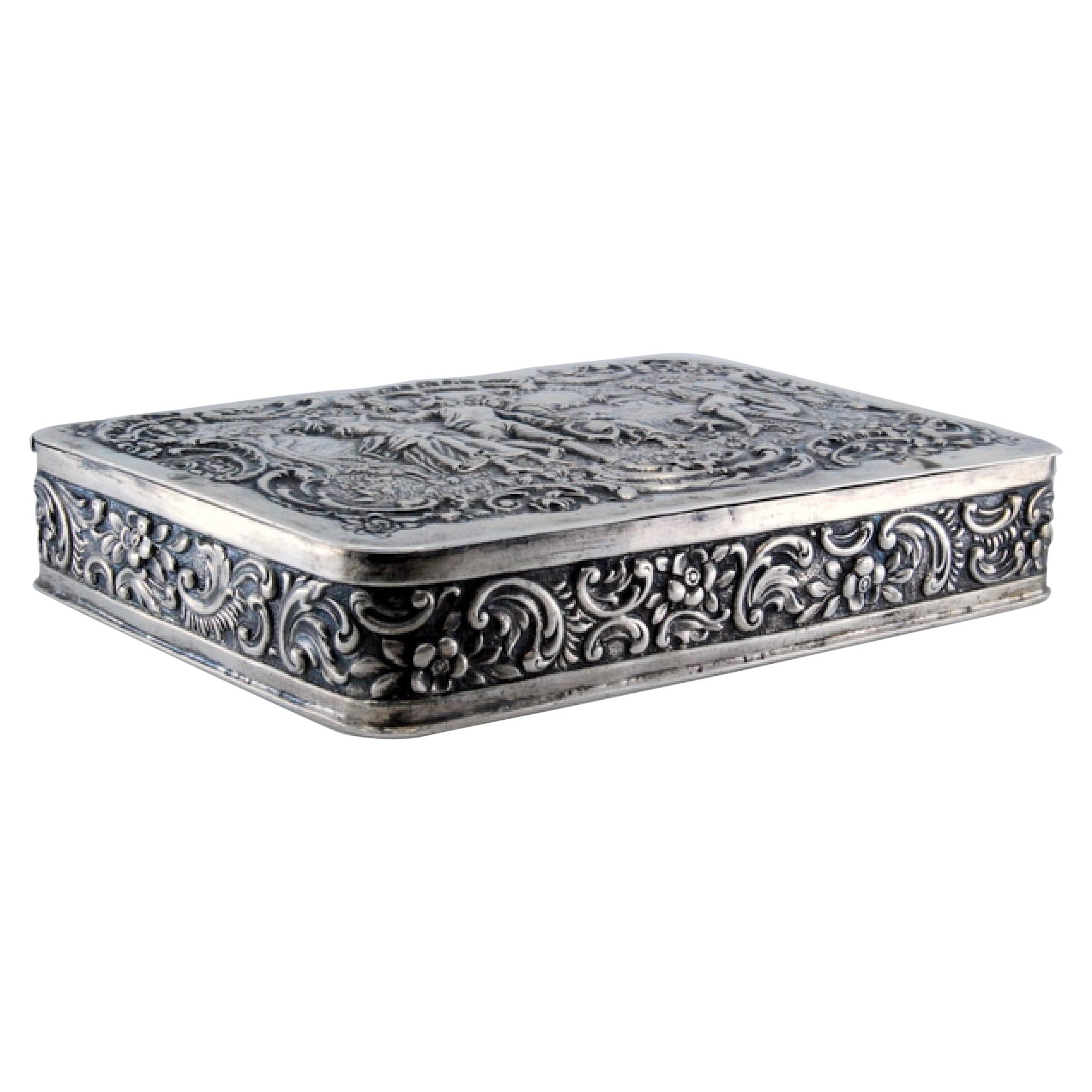 Jewelry box, in silver with folkloric motifs in relief on the hinged lid