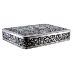 Jewelry box, in silver with folkloric motifs in relief on the hinged lid