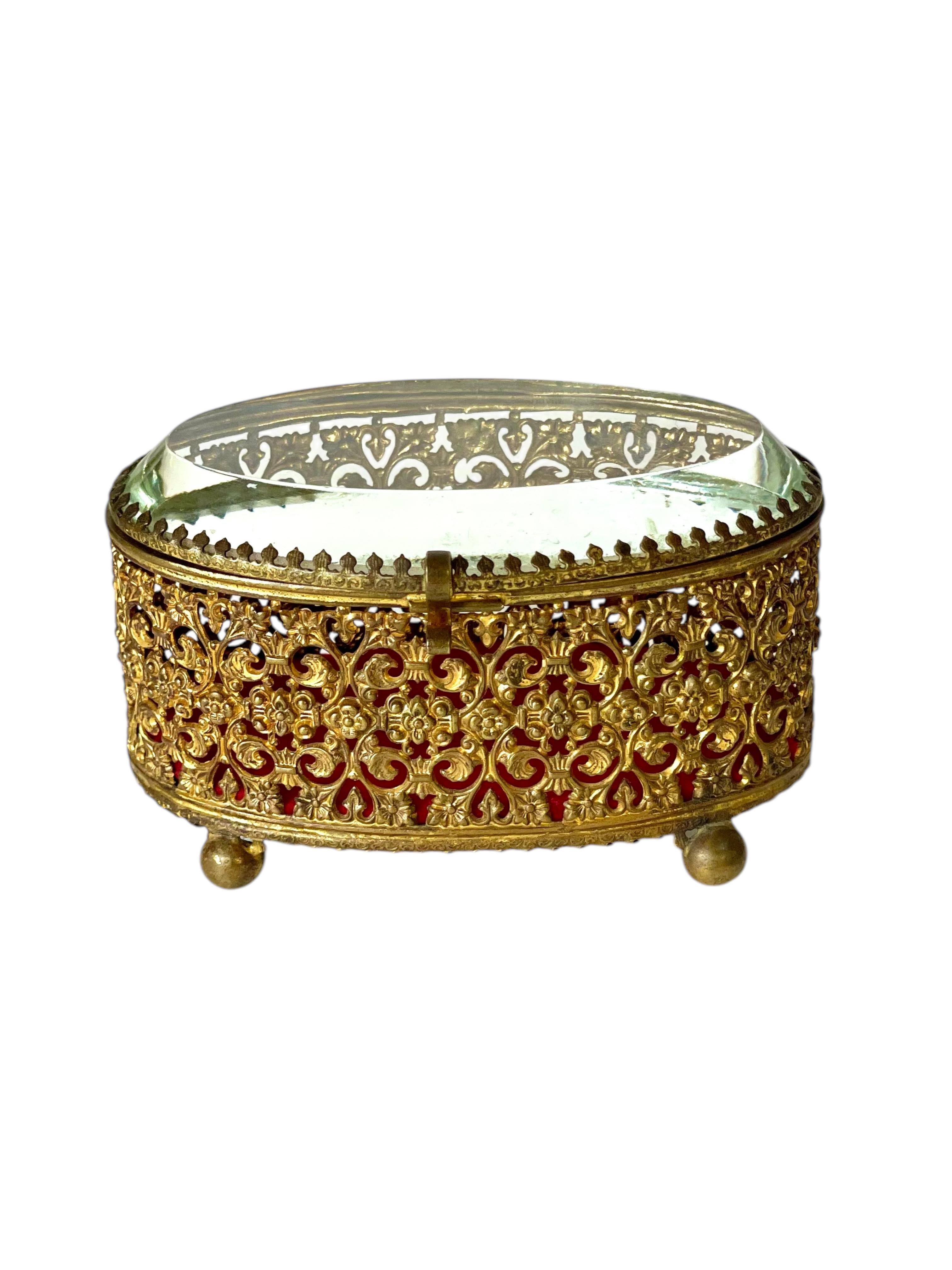 This charming antique French jewelry casket is a true little treasure in itself. Dating back to the late 19th century, this delicate box was designed with an eye for elegance and romance—exactly the kind of piece that once adorned a sophisticated