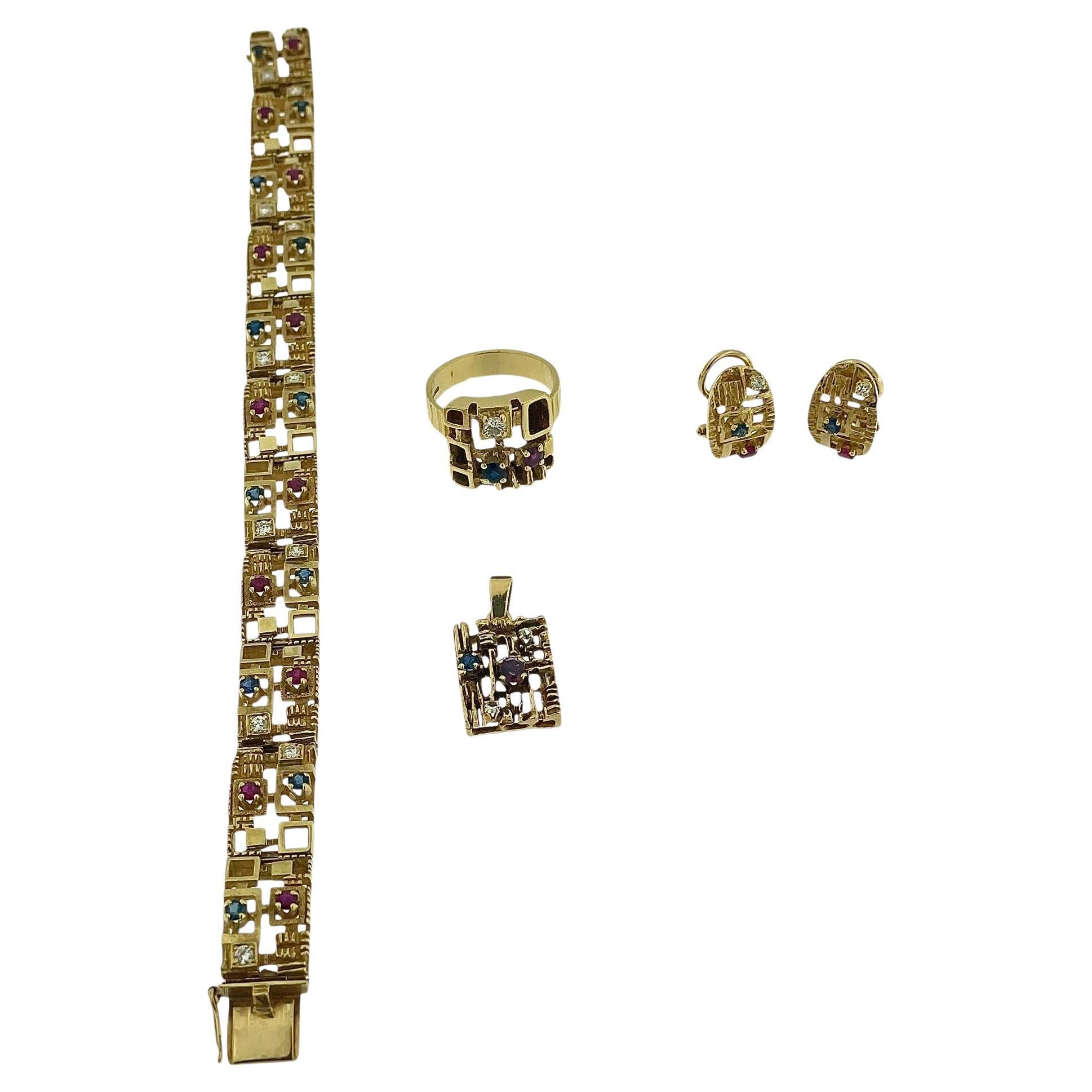 Schmuck aus 18 Karat Gelbgold mit Diamanten, Saphiren und Rubinen