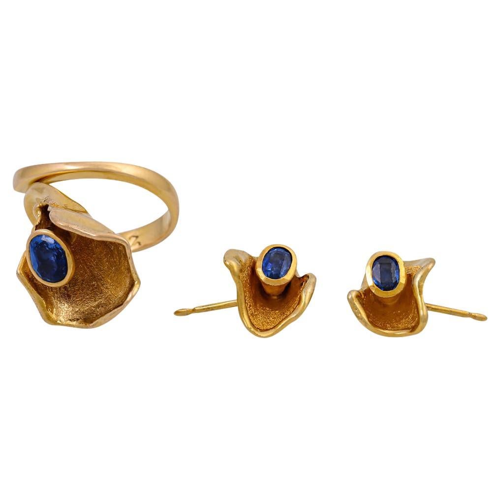 Jewelry set of ring and earrings with sapphires,