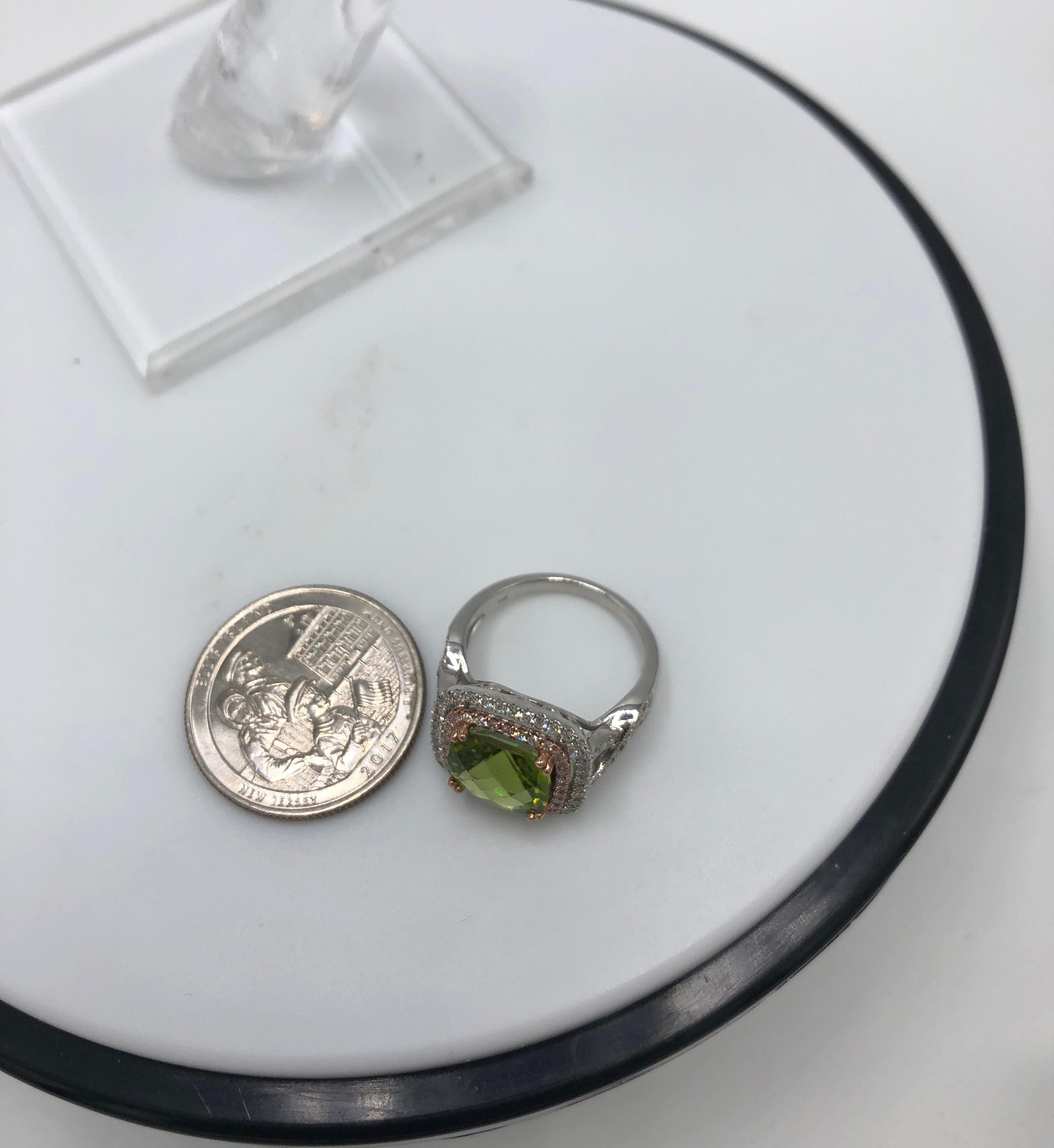 Stunning Jewels by Jacob White Gold and Rose Gold Ring with Filagree.  Faceted peridot.  14K White Gold and Rose Gold with 4.31 CT Peridot.  Cushion Cut.  .67CT Weight of Diamonds with 94 diamonds.  