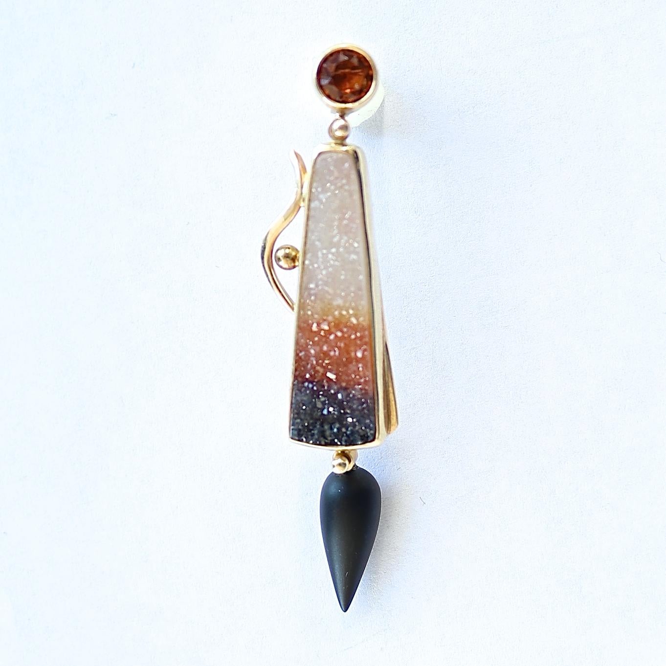 Unique ingenuity with avante-garde style. This is not your typical jewelry store. Featuring colorful citrine, quartz and jet that playfully dangle from the ear. Crafted in 18k gold. Signed Jewelsmith.