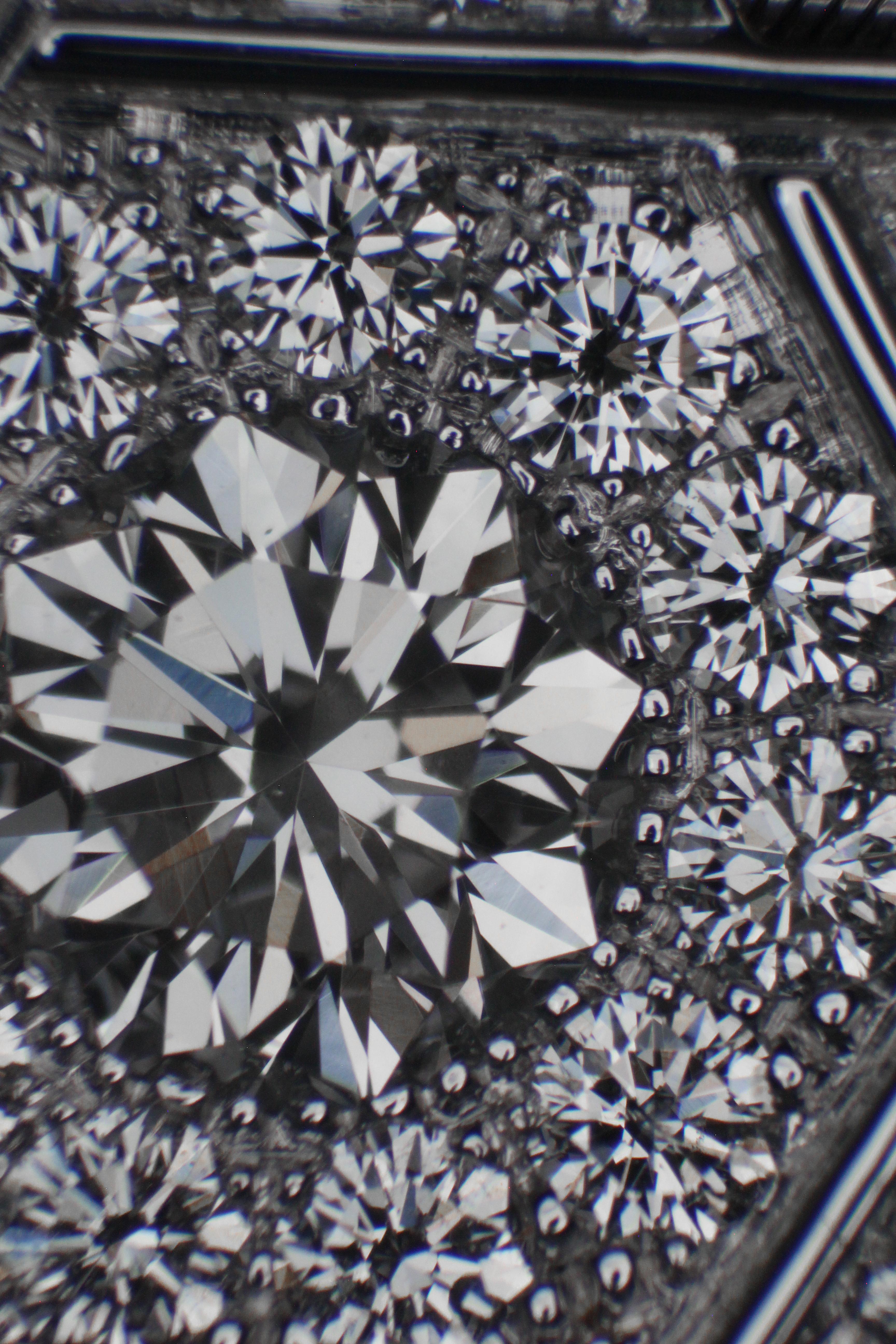 Look at the 4th picture which is the piece under high magnification in a microscope, all the beading work and diamond setting is perfect. This is what separates us from the others, we produce the best with no mistakes and everyone loves our work