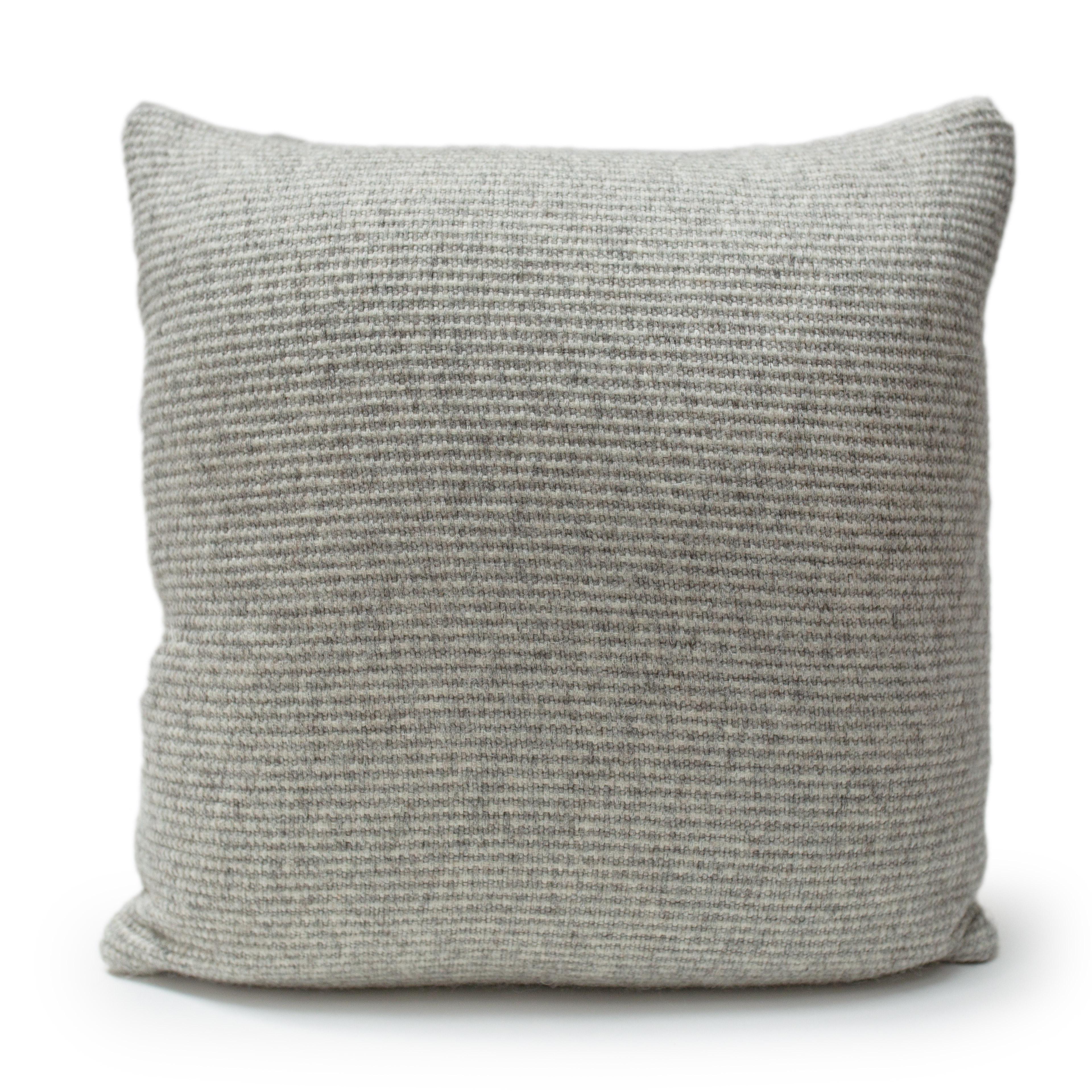 Pillow front in hand-painted, Grey Ribbon felted wool fabric by JG SWITZER, backed with Sandra Jordan Prima Alpaca fabric in Casa Pebble.

Pillow comes with a hidden zipper enclosure and ships with a high quality, custom insert. This is Dry Clean