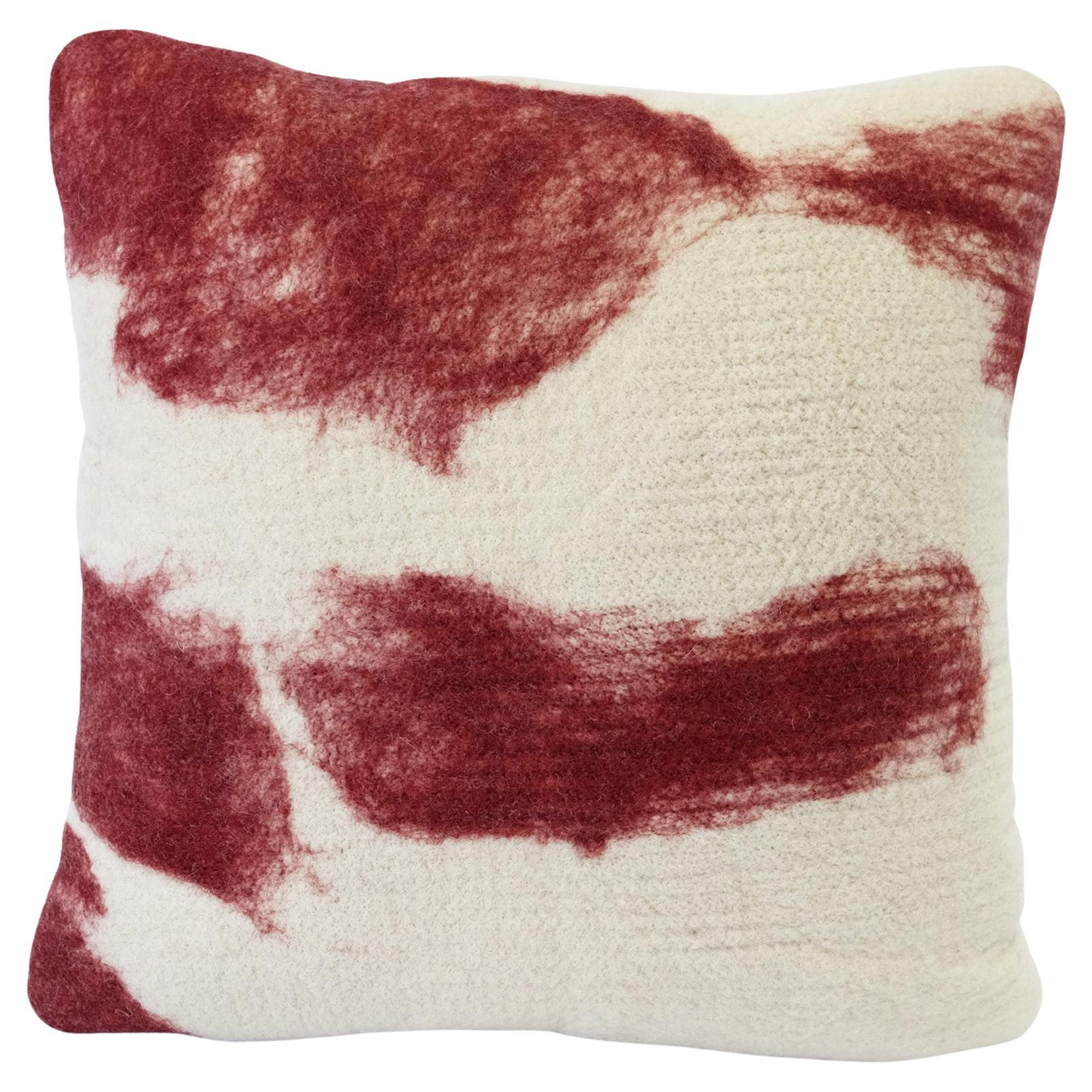 Painterly one -of-a-kind hand felted in Lipstick-red wool on a cream merino glazed base this is a modern and painterly design by JG SWITZER.  Insert is zipper enclosure pillows can be dry cleaned and insert is removal. Ships with 
