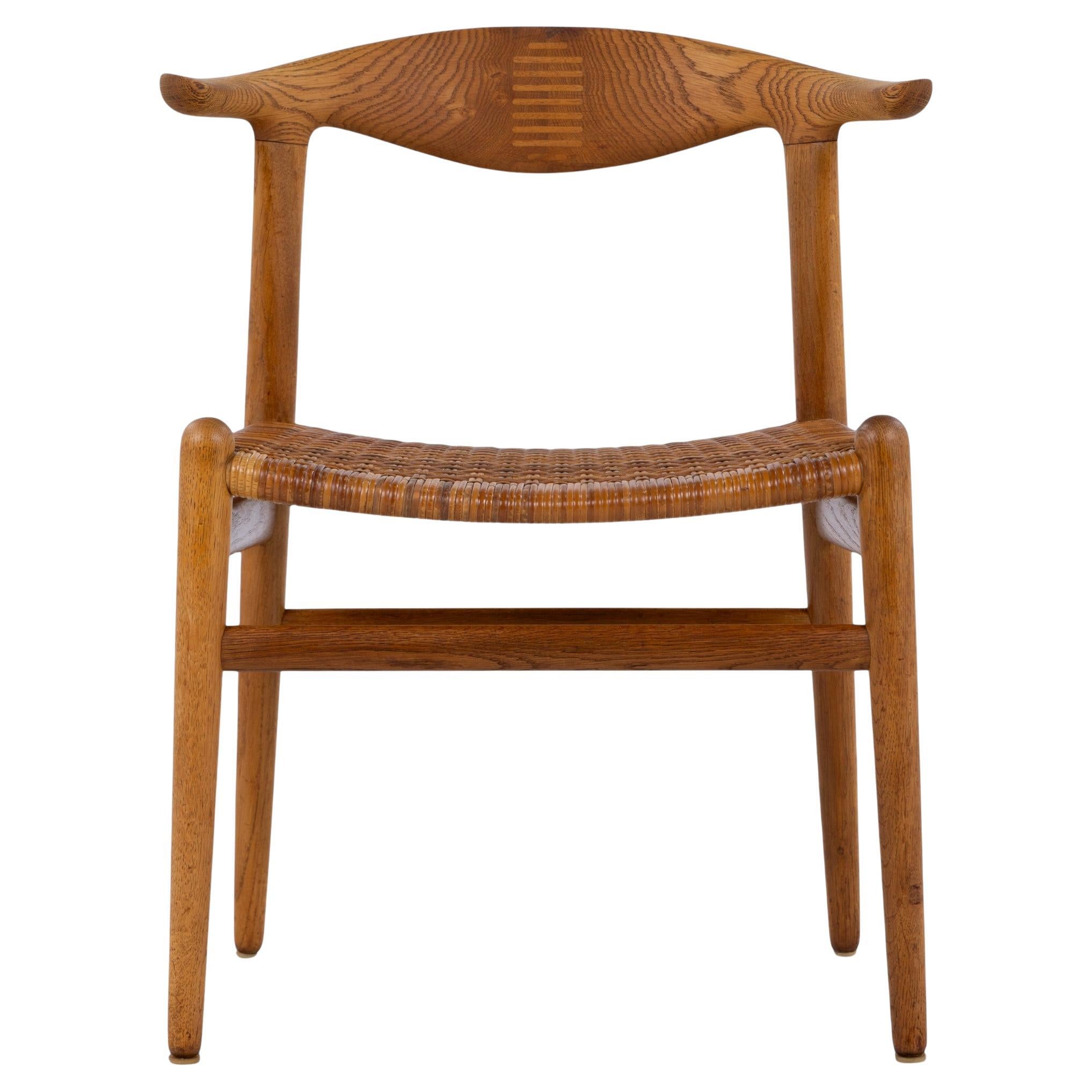 JH 505 - 'Cowhorn' in rovere di Hans J. Wegner in vendita