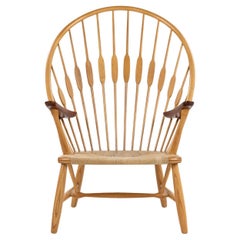 JH 550 - Silla Peacock en fresno de Hans Wegner