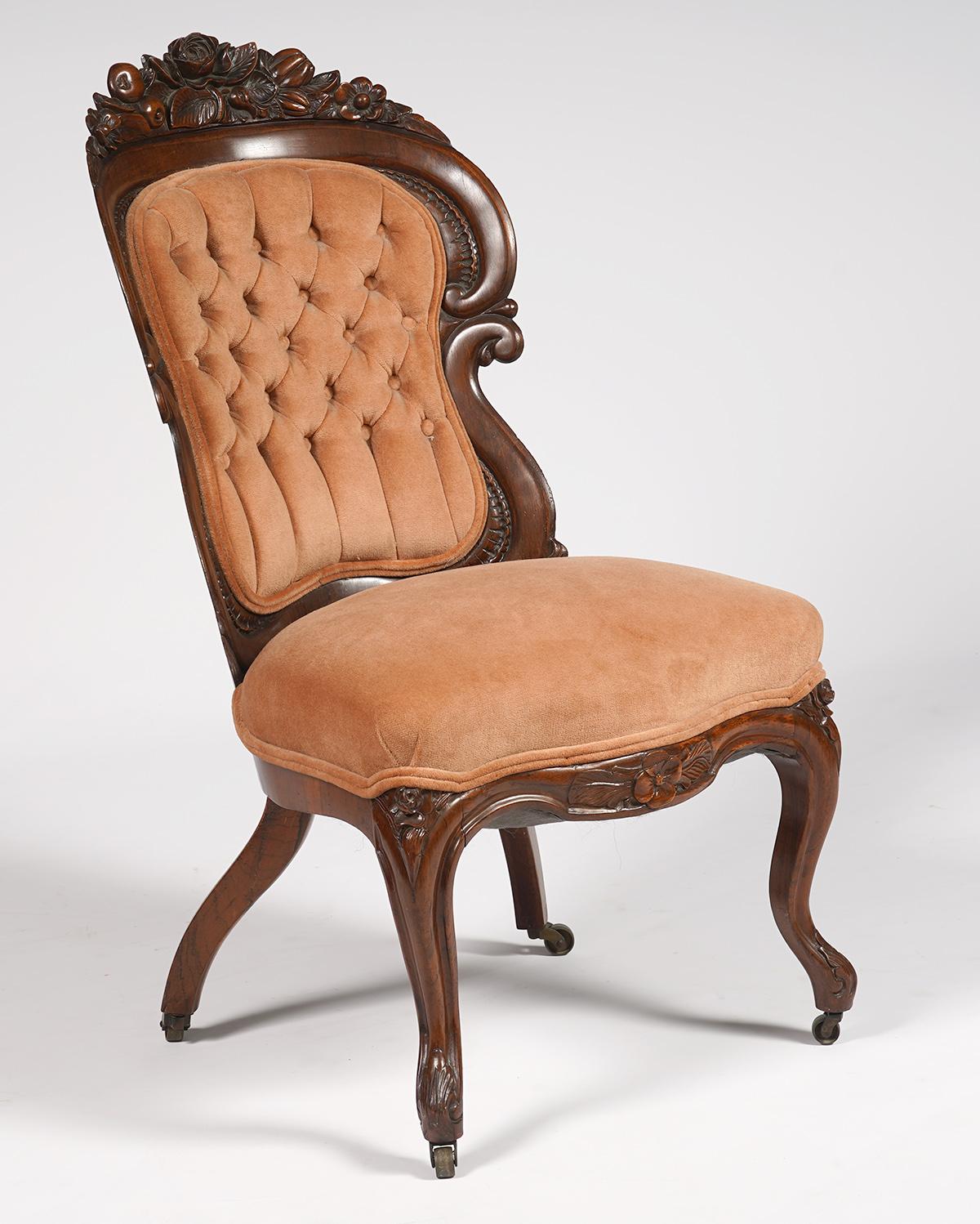 This wonderfully crafted 5 times laminated rosewood slipper chair or side chair by legendary John Henry Belter (1804-1863) is fashioned in the Henry Clay pattern. The crest is carved with flowers, fruit, filigree and a central rose above double