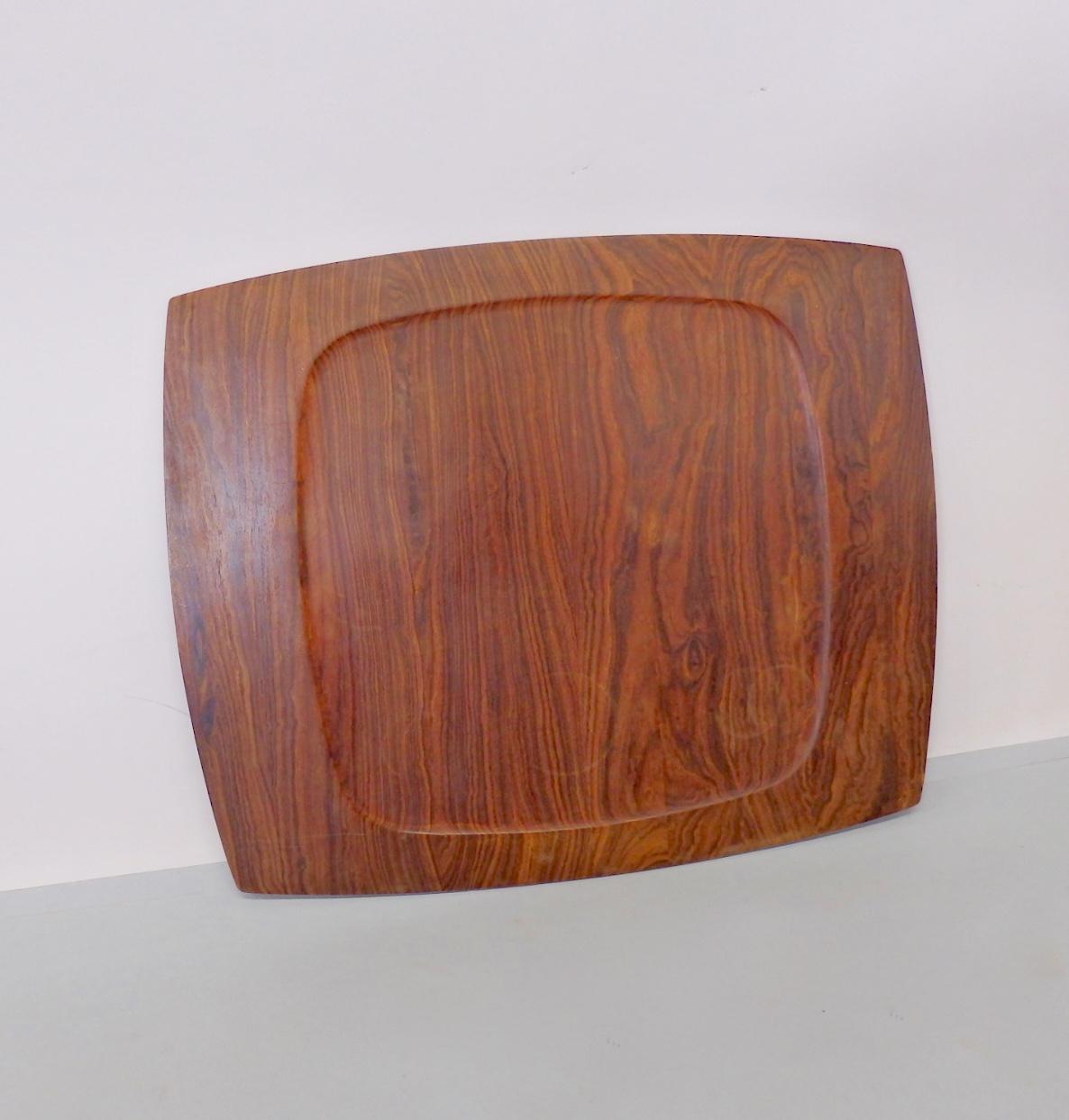 Nicely grained solid rosewood serving tray. Quality of a Jens Quisgaard piece for Dansk but unmarked .