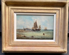 19th century antique English fishing boats by the shoreside