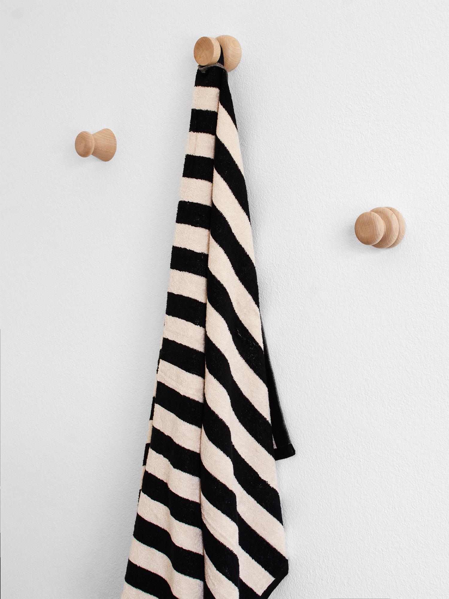 These playful, elegant maple hardwood wall hooks by Jib Projects are hand turned in our Florida studio. They are durable and ready to help organize any room in the house. Easy to install with a strong connection that won't come loose. Hardwearing