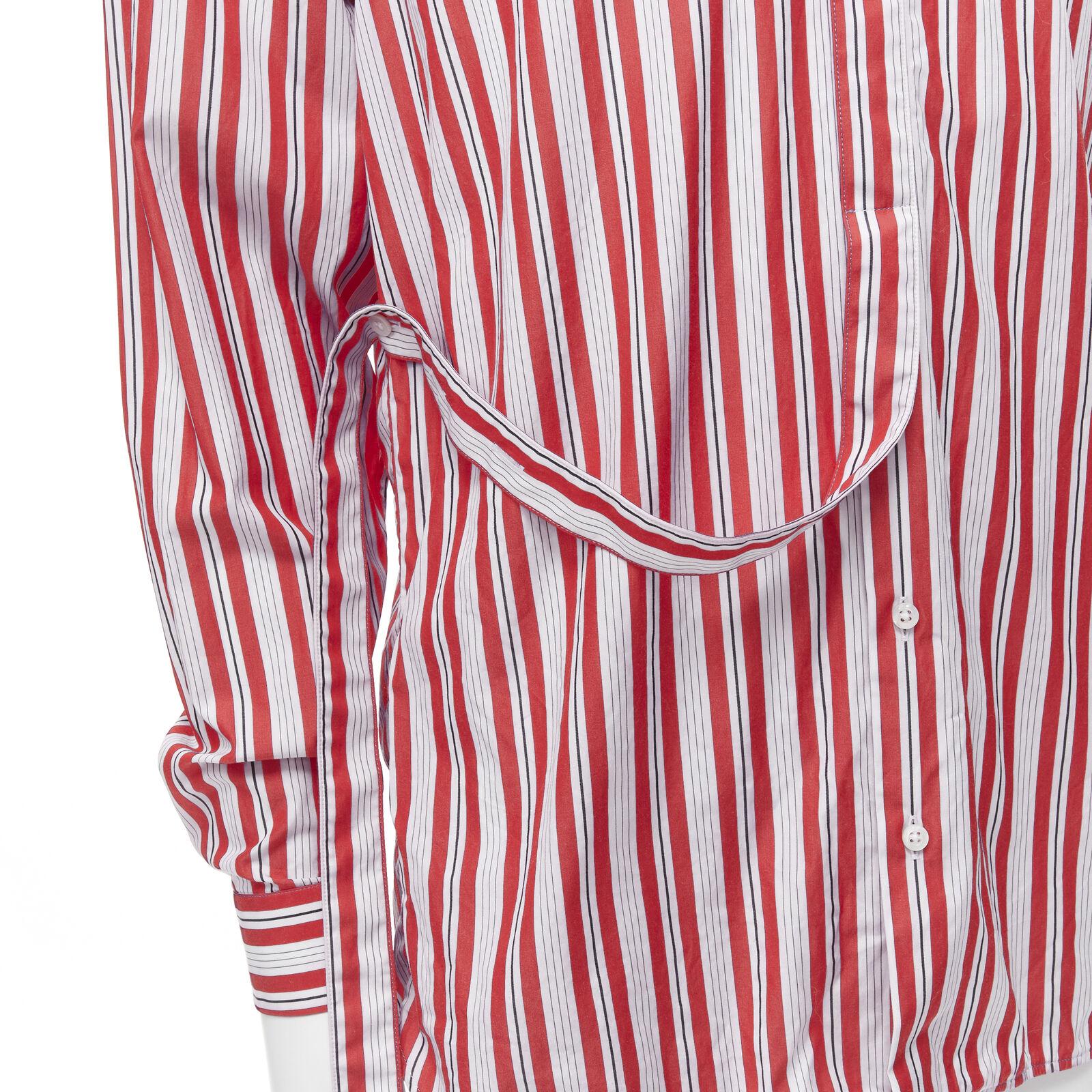 JIL SANDER 100% cotton red vertical stripes deconstructed placket shirt EU38 S
Reference: EDTG/A00078
Brand: Jil Sander
Designer: Jil Sander
Material: Cotton
Color: Red, White
Pattern: Striped
Closure: Button
Made in: Italy

CONDITION:
Condition: