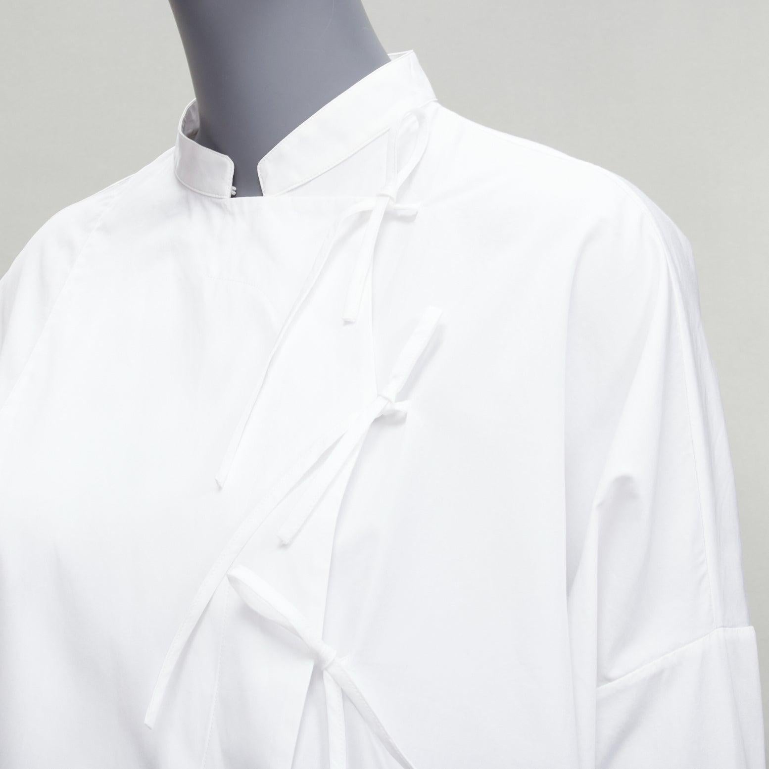 JIL SANDER 2018 white cotton tie button panelled tunic shirt dress FR32 XXS
Reference: LNKO/A02163
Brand: Jil Sander
Collection: 2018
Material: Cotton
Color: White
Pattern: Solid
Closure: Self Tie
Made in: Italy

CONDITION:
Condition: Excellent,
