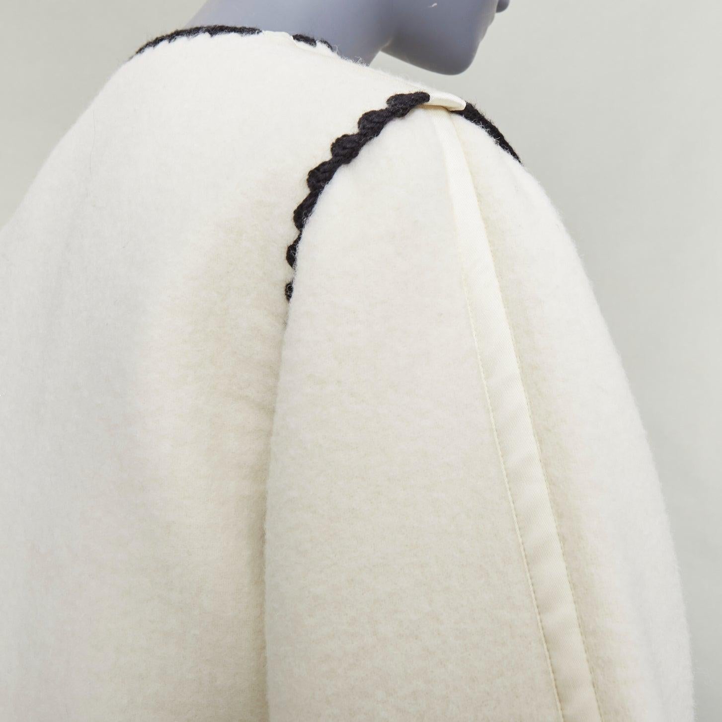 JIL SANDER 2019 Runway cream llama blend black scalloped trim wide sleeve coat FR34 XS
Reference: ZETO/A00015
Brand: Jil Sander
Collection: 2019 FW - Runway
Color: Cream, Black
Pattern: Solid
Closure: Button
Lining: Cream Fabric
Made in: