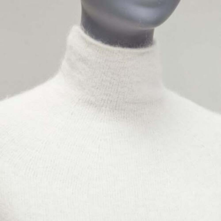 JIL SANDER 2020 white mohair virgin wool split front high neck sweater FR34 XS
Reference: LNKO/A02258
Brand: Jil Sander
Collection: 2020
Material: Mohair, Virgin Wool, Blend
Color: White
Pattern: Solid
Closure: Slip On
Extra Details: Jil Sander long