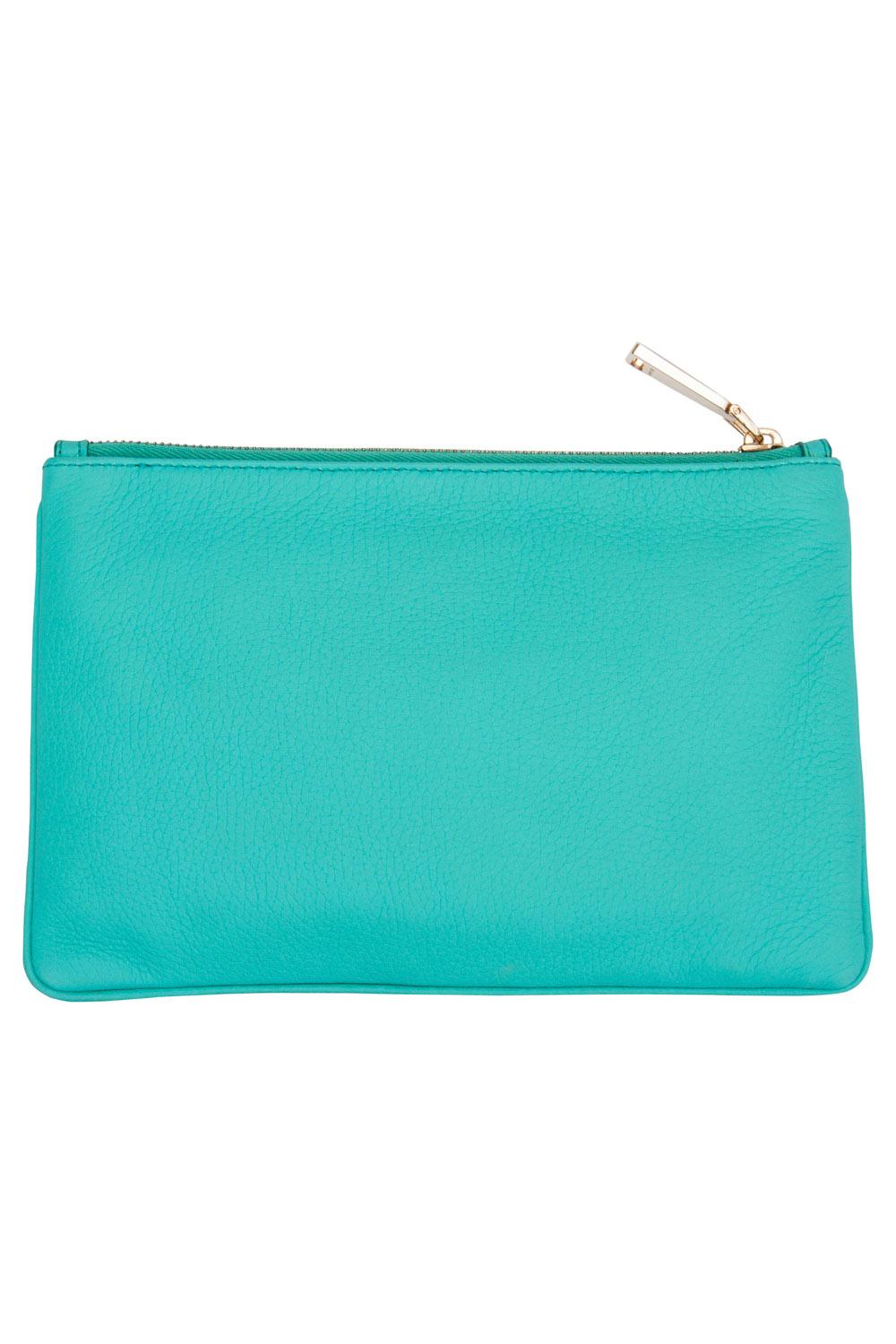 Made of leather, this pouch from Jil Sander is a creation worthy of being yours. It is designed in an aqua green shade and it has a zipper that leads to a fabric interior. The pouch is well-made and handy.

Includes: Original Dustbag


