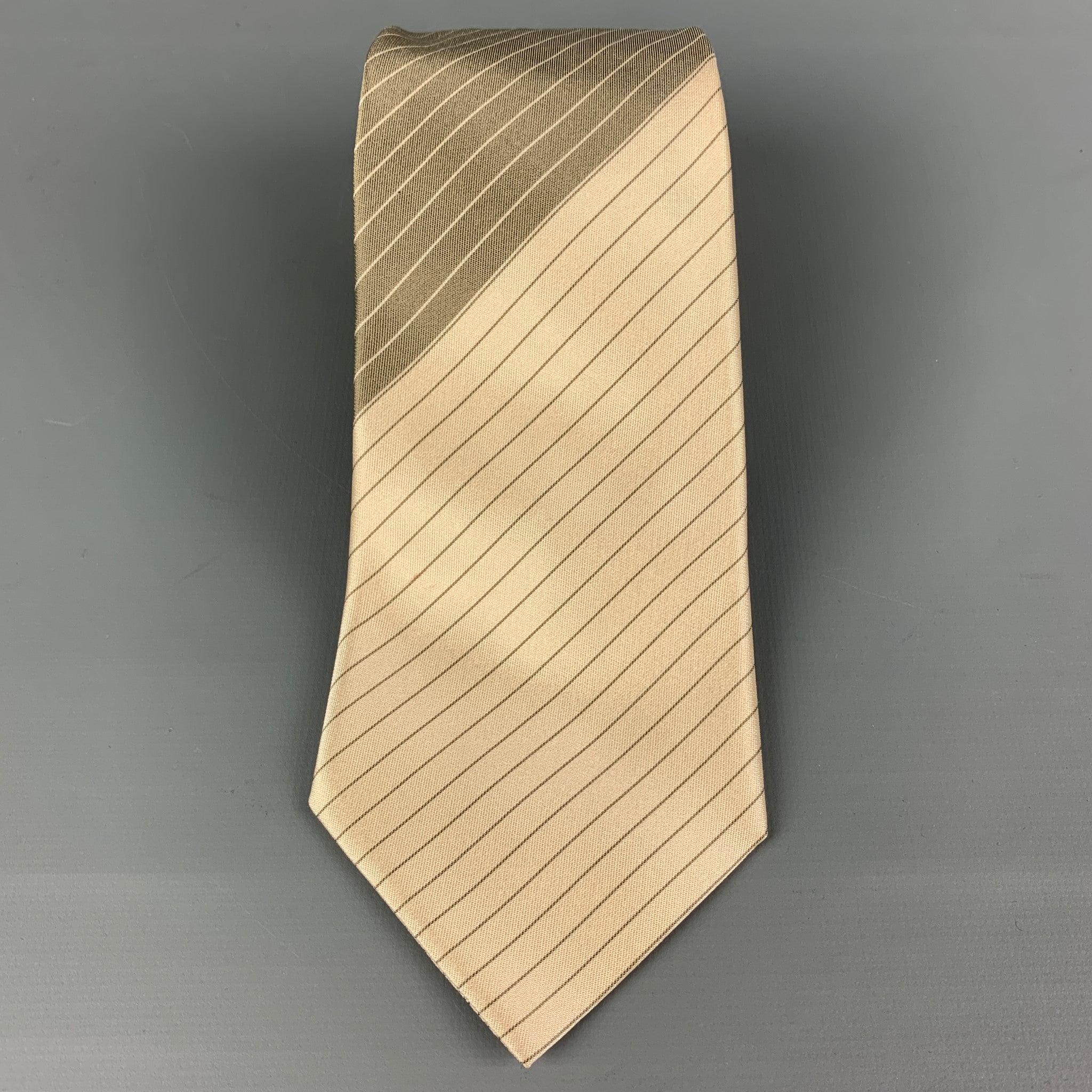 JIL SANDER
 necktie comes in a beige & grey silk twill with a all over diagonal stripe print. Made in Italy. Very Good Pre-Owned Condition.Width: 3.25 inches 
  
  
  
 Sui Generis Reference: 118898
 Category: Tie
 More Details
  
 Brand: JIL