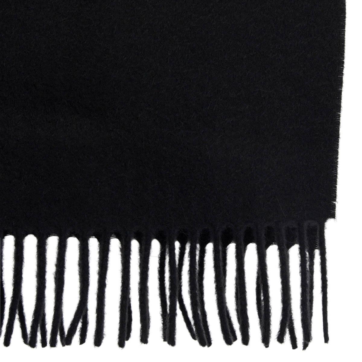 100% authentic Jil Sander shawl in black cashmere (100%). Features fringes at both ends and a 'Jil Sander' embroidery. Has been worn and is in excellent condition.

Measurements
Width	36cm (14in)
Height	165cm (64.4in)

All our listings include only