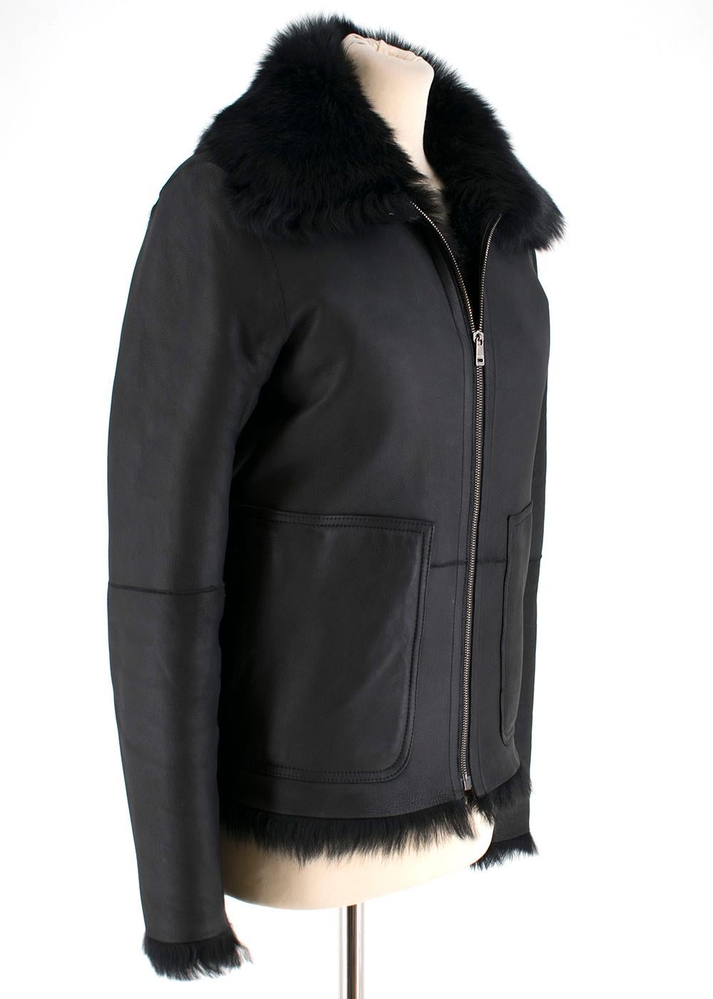 Black lambskin jacket with a fur lining, silver hardware, and a matte finish. Buttery leather mixed with an enveloping fur lining makes this a fantastic piece for consistent wear. RRP £1950


Please note, these items are pre-owned and may show signs