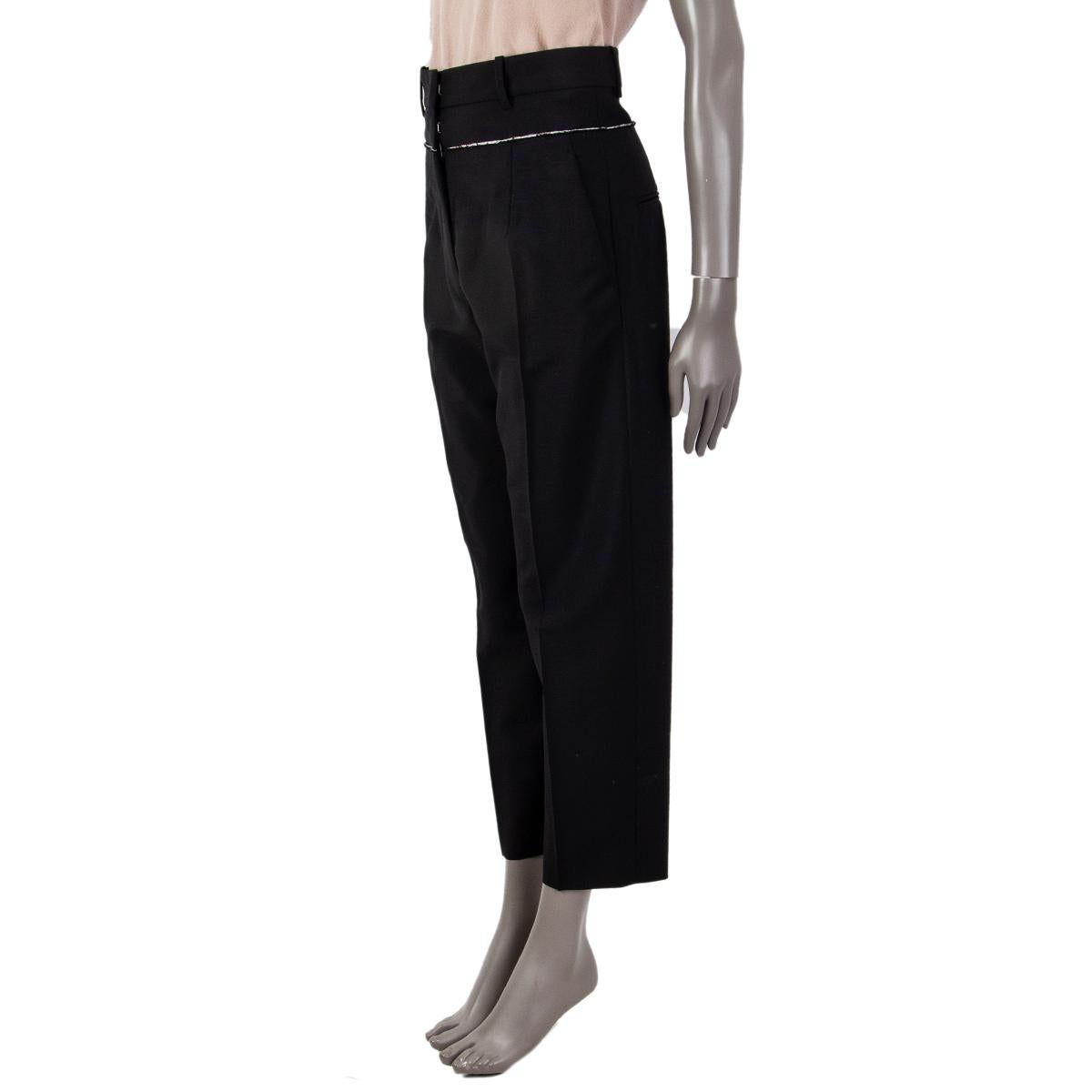 100% authentic Jil Sander high-waist suit pants in black wool (73%) and mohair (27%) with off-white trim at waist. Concealed zipper, hook and bar closure at waistand. Two side pockets and two welt pockets at the back. Unlined. Have been worn once