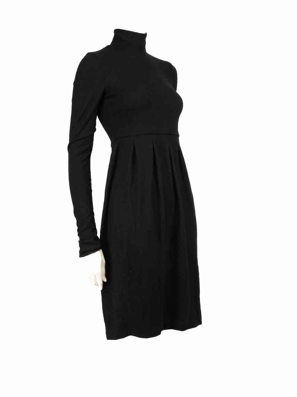 CONDITION is Very good. Hardly any visible wear to dress is evident on this used Jil Sander designer resale item.
 
 
 
 Details
 
 
 Black
 
 Wool
 
 Dress
 
 Knee length
 
 Turtleneck
 
 Long sleeves
 
 Pleated skirt
 
 Back zip fastening
 
 
 
 
