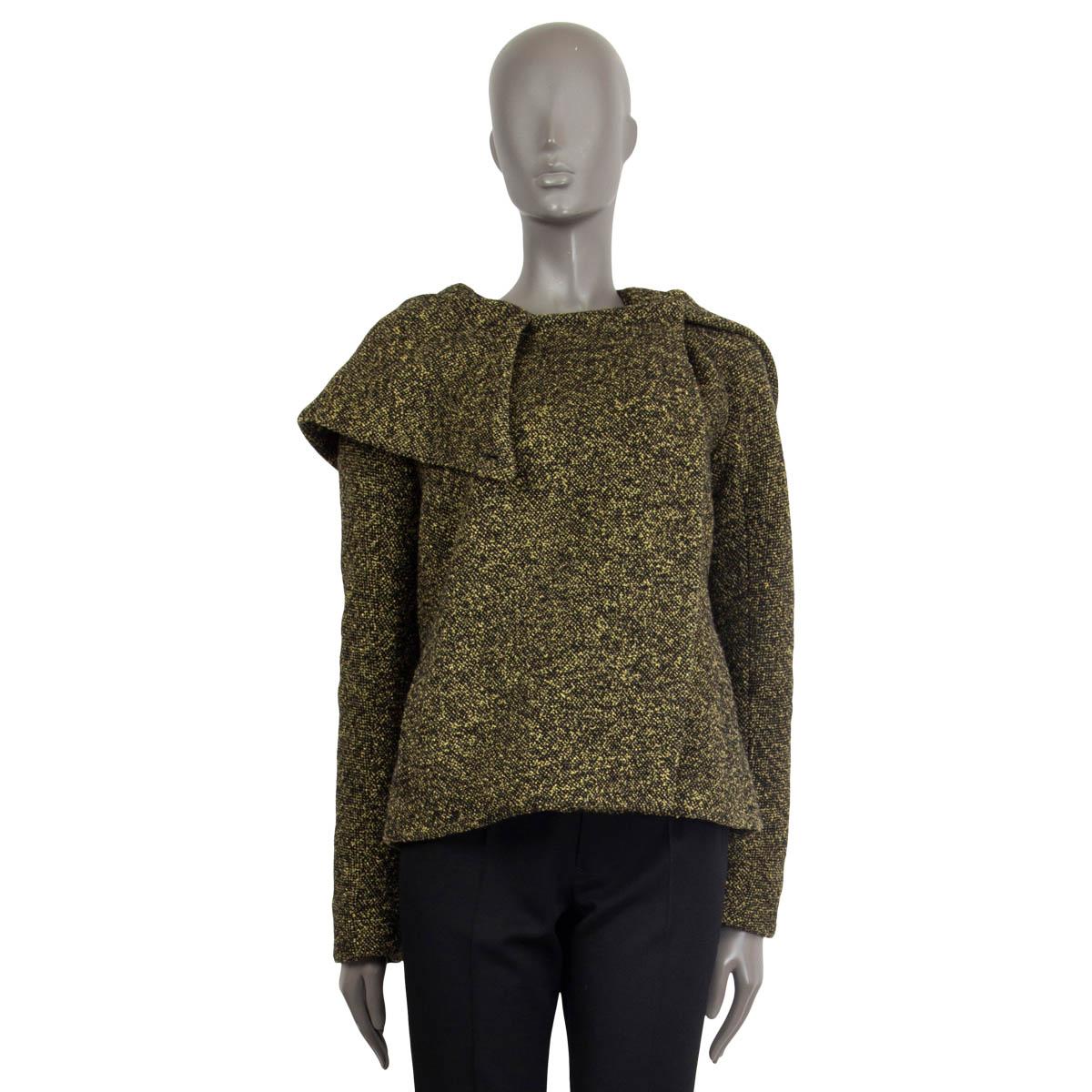 Chaqueta Jil Sander 100% auténtica de lana negra y verde lima (50%) y acetato (50%). Con capucha extragrande y dos bolsillos con aberturas en la parte delantera. Se abre con cinco botones ocultos. Forro de poliéster (100%). Se ha usado y está en