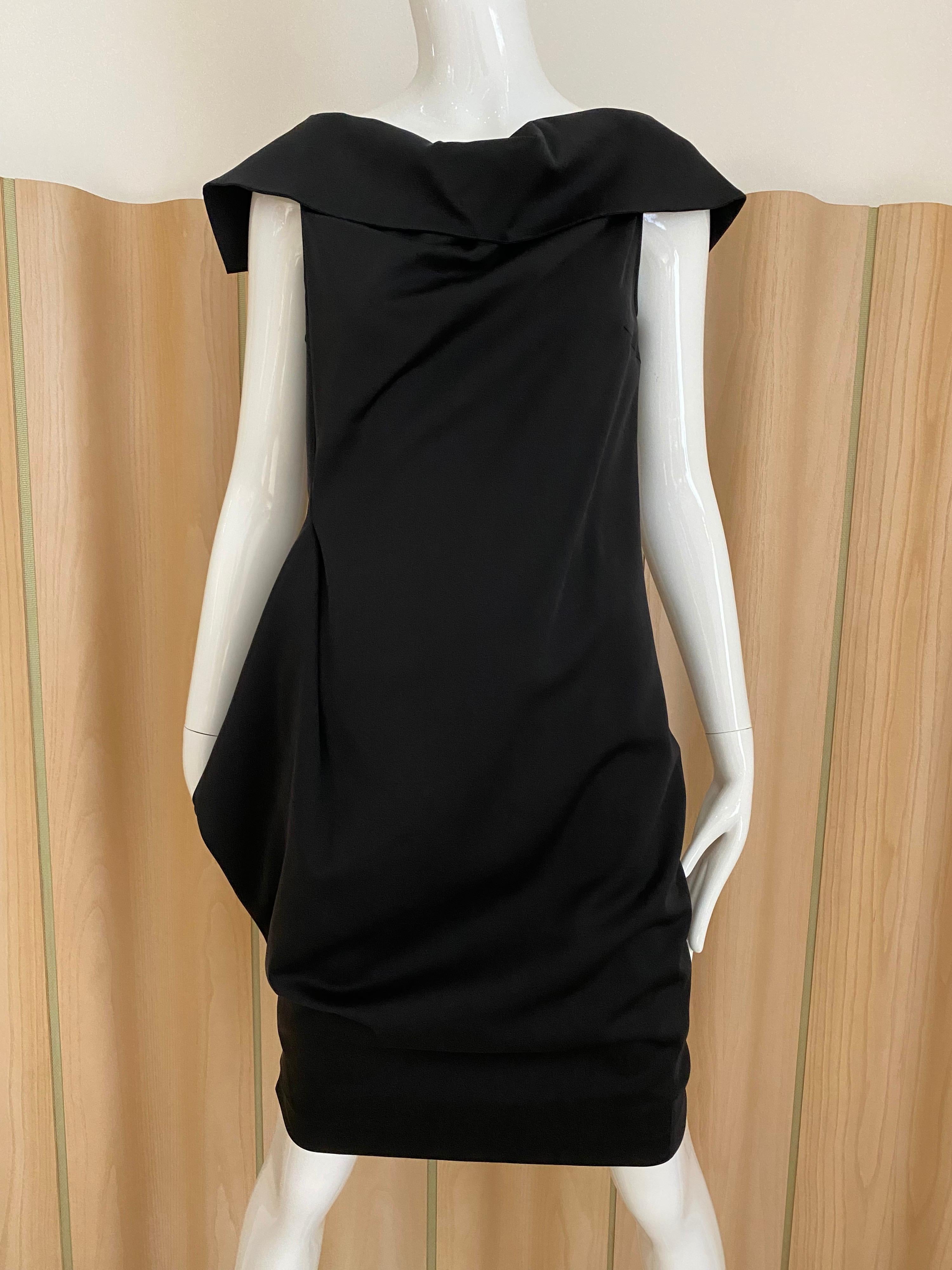 2000s Jil Sander by raf simons black cocktail dress.
Marked size 38
small- medium