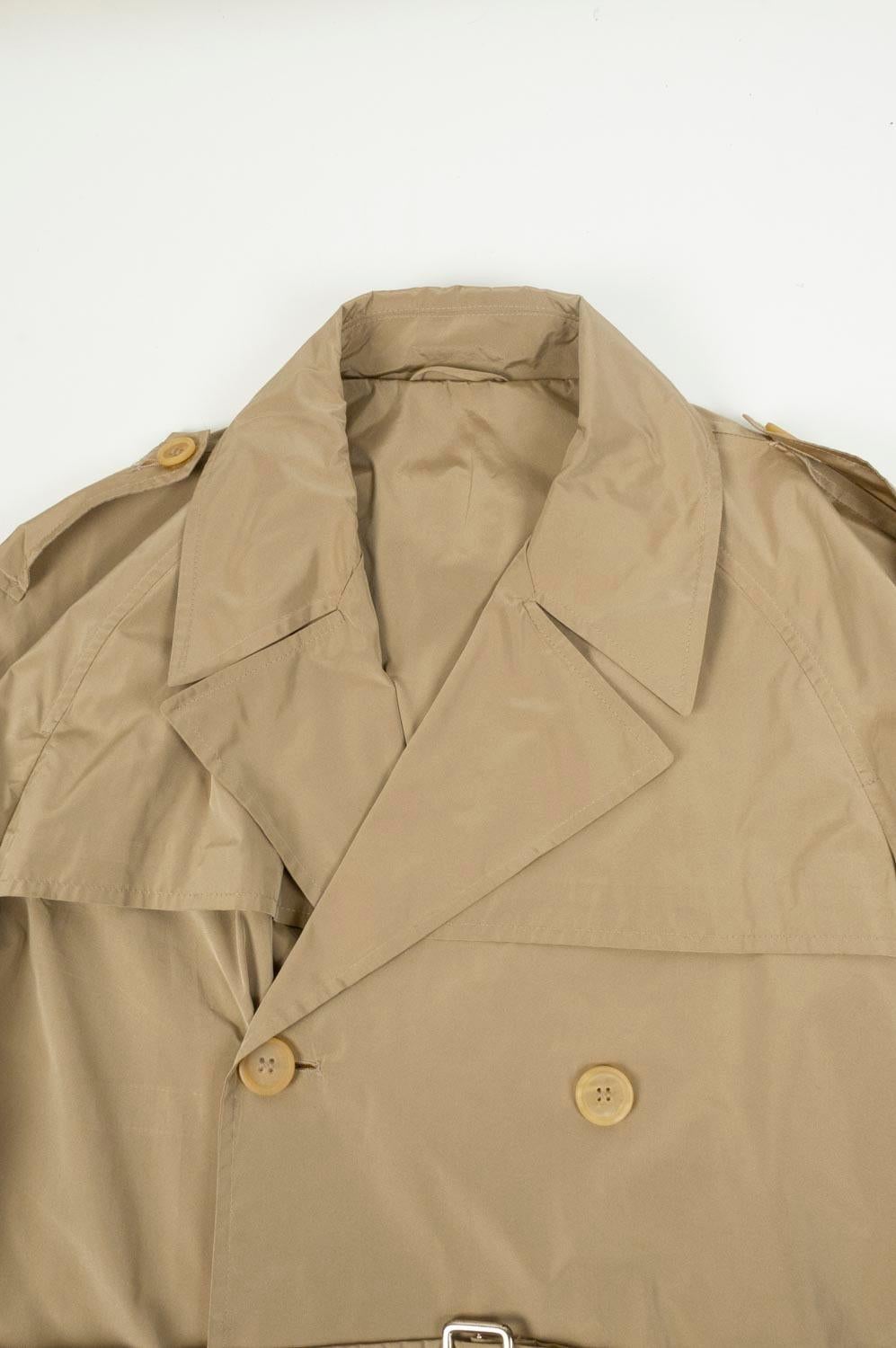 Item for sale is 100% genuine Jil Sander Trench Coat by Raf Simons, S427
Color: Light Shinny Brown
(An actual color may a bit vary due to individual computer screen interpretation)
Material: 100% polyester
Tag size: 44 runs Large
This coat is great
