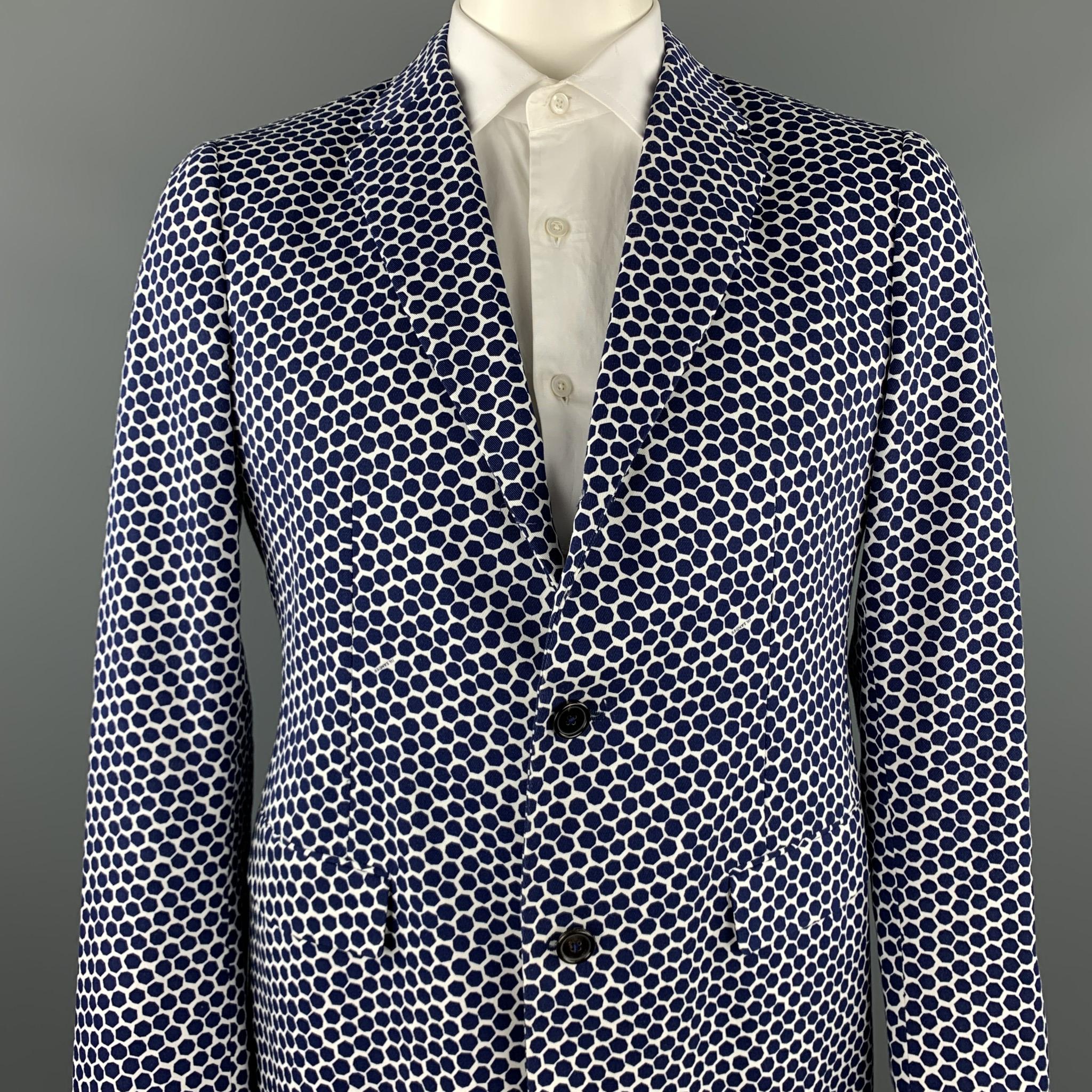 JIL SANDER by RAF SIMONS sport coat comes in a navy & white geometric cotton featuring a notch lapel, flap pockets, and a three button closure. Made in Italy.

Excellent Pre-Owned Condition.
Marked: IT 54

Measurements:

Shoulder: 18 in. 
Chest: 44