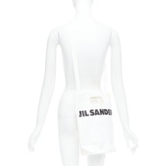 JIL SANDER cream black laminated paper logo crossbody tote bag